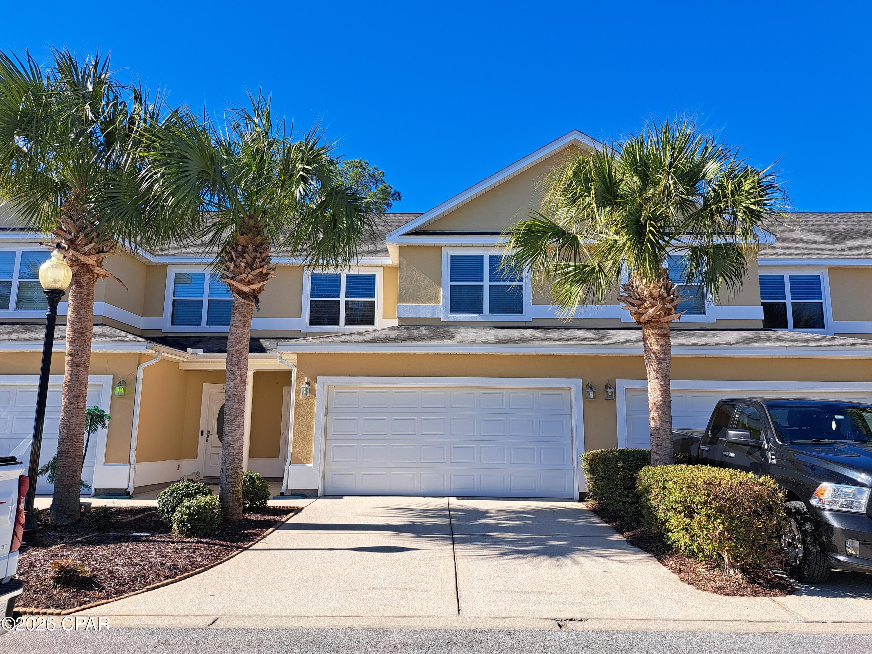 Welcome to your dream home in the heart of Panama City Beach, FL. This stunning property boasts three spacious bedrooms and 2.5 well-appointed bathrooms. The house is designed with a perfect blend of comfort and modernity, ensuring a luxurious living experience. The community pool is a great place to relax and unwind, while the clubhouse offers a space for socializing and entertainment. The location is a true highlight, with the beautiful Panama City Beach and NSA Panama City just a stone's throw away. Additionally, the house is conveniently located near shopping and dining options, making it an ideal choice for those who value accessibility and convenience. Experience the best of Florida living in this beautiful home. Washer and Dryer included. Small dogs only. No cats.