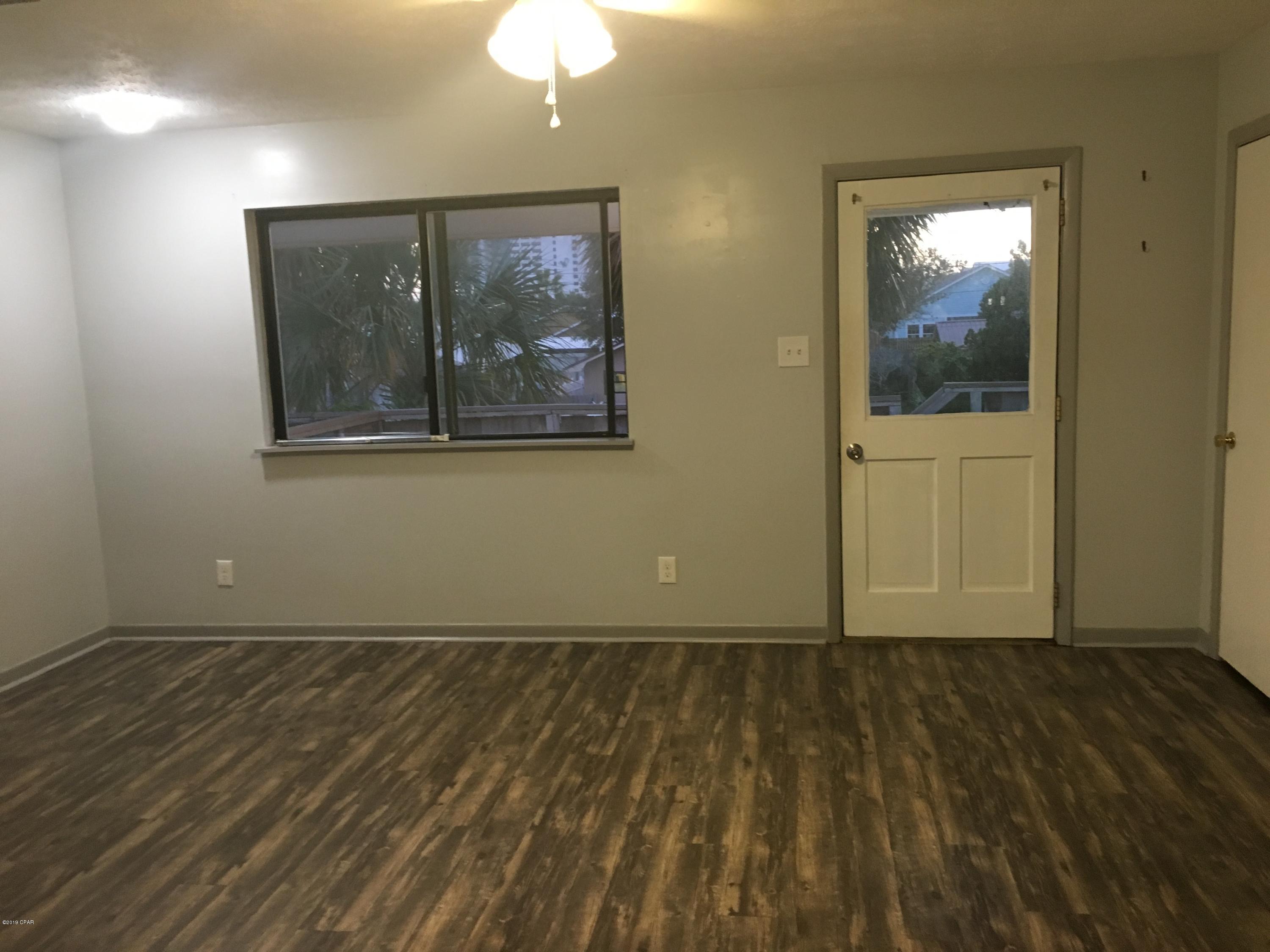 Available immediately for long term lease!  Unfurnished 2 bedroom, 1 bathroom apartment on the east end of PCB off Thomas Drive.  $1075/month and rent includes water, pest control and trash. Walking distance to the beach, convenience store and restaurants!