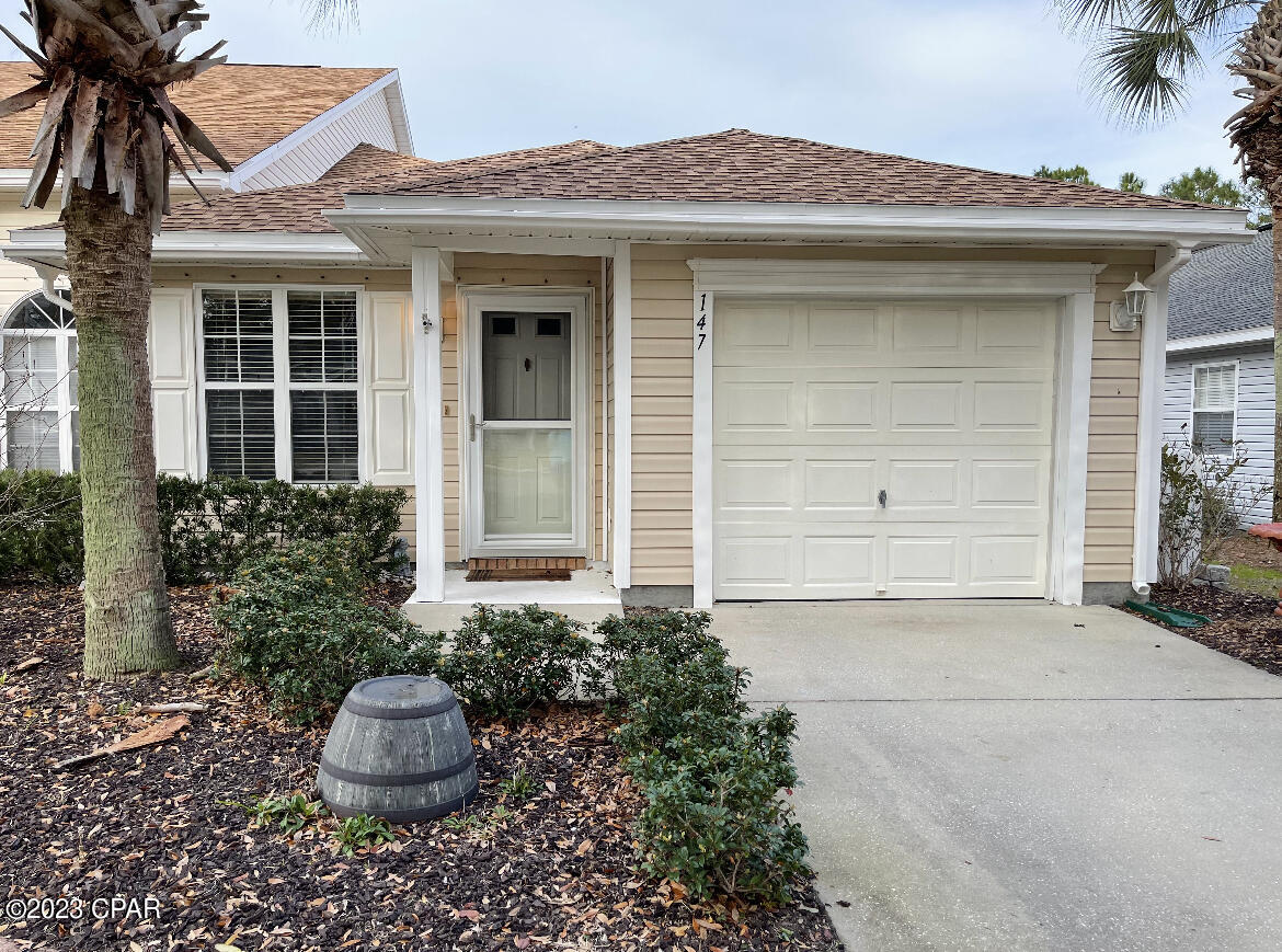 Rental townhouse unit in a great location, available October 1st! Centrally located in PCB and close to everything, this 2 Bedroom, 2 Bath, has an enclosed Sunroom that is  heated and cooled, plus a 1 Car Garage. The completely refreshed, one level townhouse is an end unit with beautiful backyard views of protected Florida wilderness. Palmetto Trace is an owner association based beautiful community, an easy walk to Pier Park, shopping and the beach. It features 2 community pools with separate entrances from Back Beach or Pier Park Drive. Only 20 minutes to the Airport and 15 minutes to 30A. Rental information consists of: $2400 month with a 12 month lease and $1000 deposit. No animals over 25 lbs. (Requires additional $500 non-refundable pet fee).