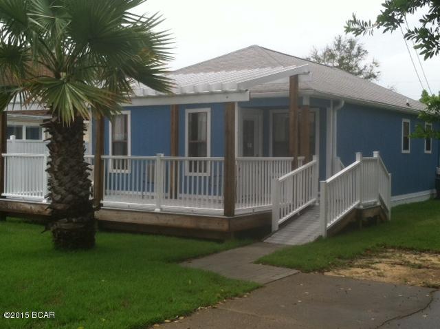 Remodeled 850 sq/ft, single level house. Remodel includes new drywall, engineered hardwood floor with ceramic tile in entry and bath/laundry. Rebuilt bath, laundry and kitchen with new appliances except for the stove. All ceiling fans and electrical outlets and switches have been replaced. Replaced all doors. Repainted interior and exterior. New ground skirting, eaves and gutters. Fantastic front porch 10 x 20 with stairs and ramp and rear porch 8 x 16 both with composite deck boards. Freshly laid sod. HVAC unit, roof and septic system in proper working order. Ample room to park Motorhome, if you add 300 sq ft you could have master bedroom with bath. Neighborhood consists of permanent home owner residents.  Home Warranty being offered with acceptable offer.