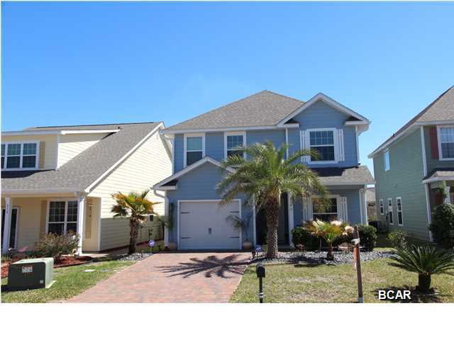 BACK ON MARKET - REDUCED $5,000.  Beautiful 2-story Turtle Cove home with 4 bedrooms plus very large bonus room upstairs and 3.5 bathrooms. MASTER ON THE MAIN FLOOR. The shower in the master bathroom is tiled all the way to the ceiling with frame-less glass doors. Kitchen is open to the living area with room for 4 bar stools. GRANITE COUNTER TOPS in all 3.5 bathrooms and in the kitchen. Second master bedroom upstairs. Stainless steel appliances, crown molding, hardwood floors, tile and carpeting, wood cabinets in kitchen, SECURITY SYSTEM with cameras. This home has a GARAGE, gutters and is fully fenced in the back. Other exterior features include brick pavers on the driveway and round rock (instead of pinestraw) at the front of the home, automatic sprinkler system, hardiplank siding. in a great neighborhood. Easy to show, call your agent to set up the showing.