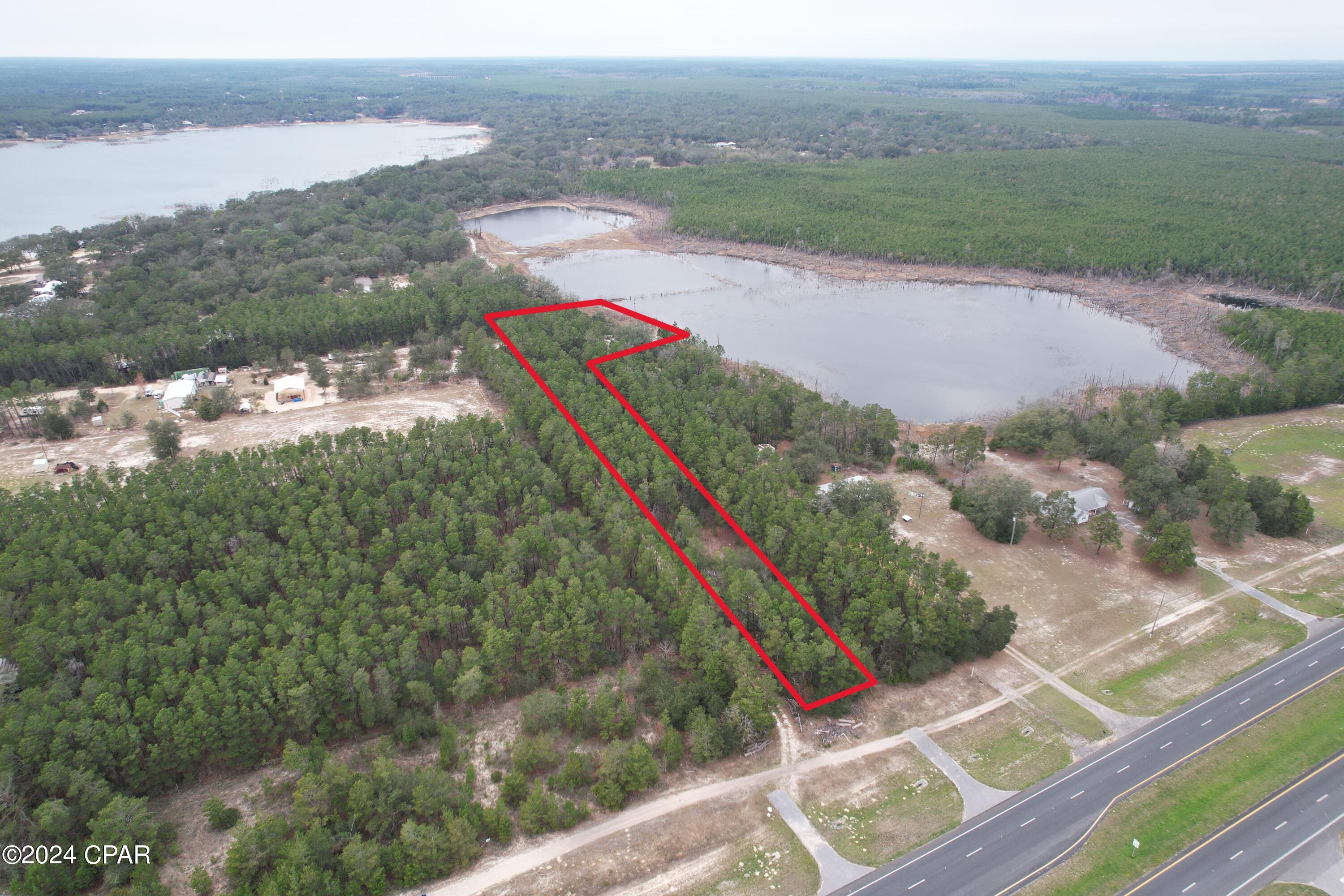 Nestled on the edge of a picturesque small lake, this 2-acre parcel offers an enchanting escape from the hustle and bustle of everyday life.