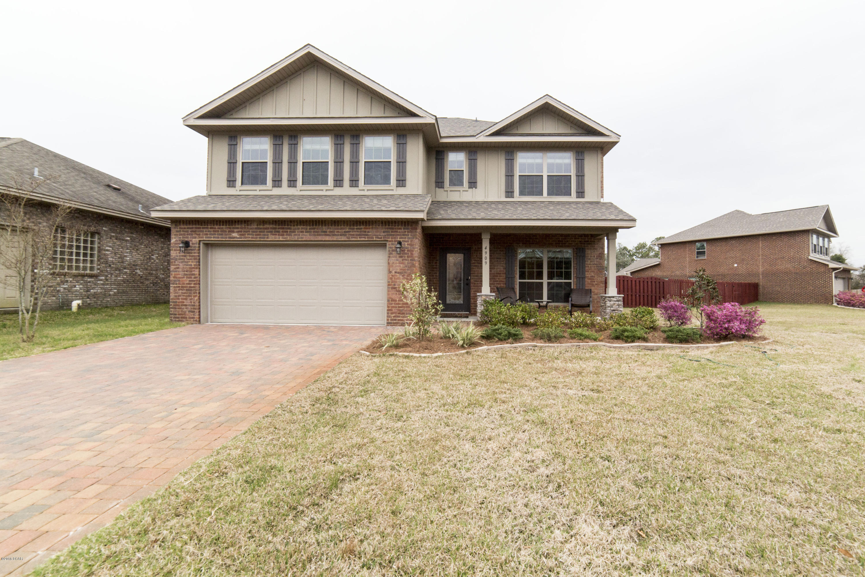 This beautiful home is located in a gated community convenient to shopping and Tyndall AFB. There are 4 bedrooms, 3 1/2 baths, and a bonus room. The living room features gorgeous real hardwood floors, recessed lighting, and a ceiling fan. The kitchen boasts granite countertops, stainless steel appliances, pantry, and a dining area. The master bedroom features walk in closet and the master bathroom has dual sinks. On the second floor, a large bonus room makes a great area for a game or theater room. Bedrooms 2 and 3 are connected by a Jack n Jill bathroom with a double vanity. The laundry room is conveniently located in the hall. Irrigation system, wavered driveway, covered back patio, and two car-garage. All measurements are approx, please verify if important.