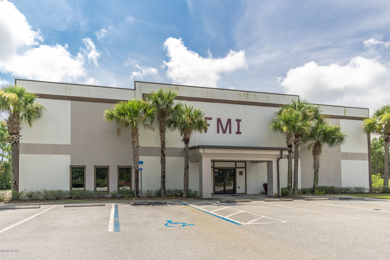 Fantastic Opportunity to own a 31,000 SF building on almost 5 acres of land in Beach Commerce Park, the only industrial park on Panama City Beach, near all of the growth in South Walton and Panama City Beach and less than 10 miles to the Panama City Beach Airport and about 7 miles to the 30-a / South Walton corridor. Sale comes with approximately two acres of vacant land for yard area or additional buildings. This property is unique in location, size and with the right user could be a heck of a long term investment with upside. Property is being sold with the vacant lot.