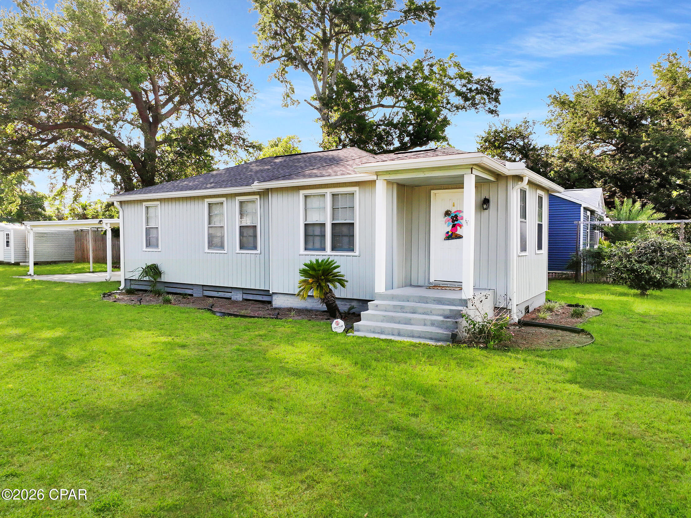 This charming coastal cottage in the heart of Port St. Joe offers the relaxed Florida lifestyle so many buyers are searching for. Situated on a spacious corner lot just minutes from St. Joseph Bay, this inviting home features bright, oversized living and dining spaces filled with natural light and a warm coastal feel throughout. Offered fully furnished, this move-in ready property comfortably sleeps six or more guests, making it ideal as a full-time residence or vacation getaway. Just bring your swimsuit and start enjoying coastal living.

The large yard offers plenty of room for entertaining, pets, gardening, or future outdoor additions. A covered patio creates the perfect space for cookouts and relaxing after a day on the water, while the storage shed provides additional room for beach gear, fishing equipment, and tools. With no HOA restrictions, there is ample parking for boats, golf carts, campers, and multiple vehicles.

Located just a short walk, bike or golf cart ride from downtown Port St. Joe, this home offers convenient access to shopping, schools, marinas, parks, pickleball courts, boat ramps, and beautiful Gulf Coast beaches. Spend your days boating, fishing, kayaking, scalloping, or enjoying sunset views along St. Joseph Bay. Whether you're searching for a primary residence, second home, or investment property as a long-term rental this property offers outstanding potential in one of Florida's most beloved coastal communities.