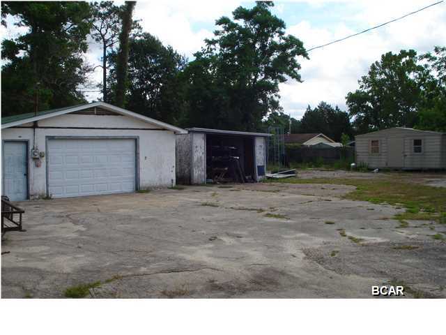 Nice large commercial property just under half an acre on the corner of Transmitter and D Street. Has been being used as the operation center for Benchmark Plumbing. Property has a solid 1000 S/F building that is great for storage or workshop. Entire property has a 6 ft chain link fence... Call to make Offer