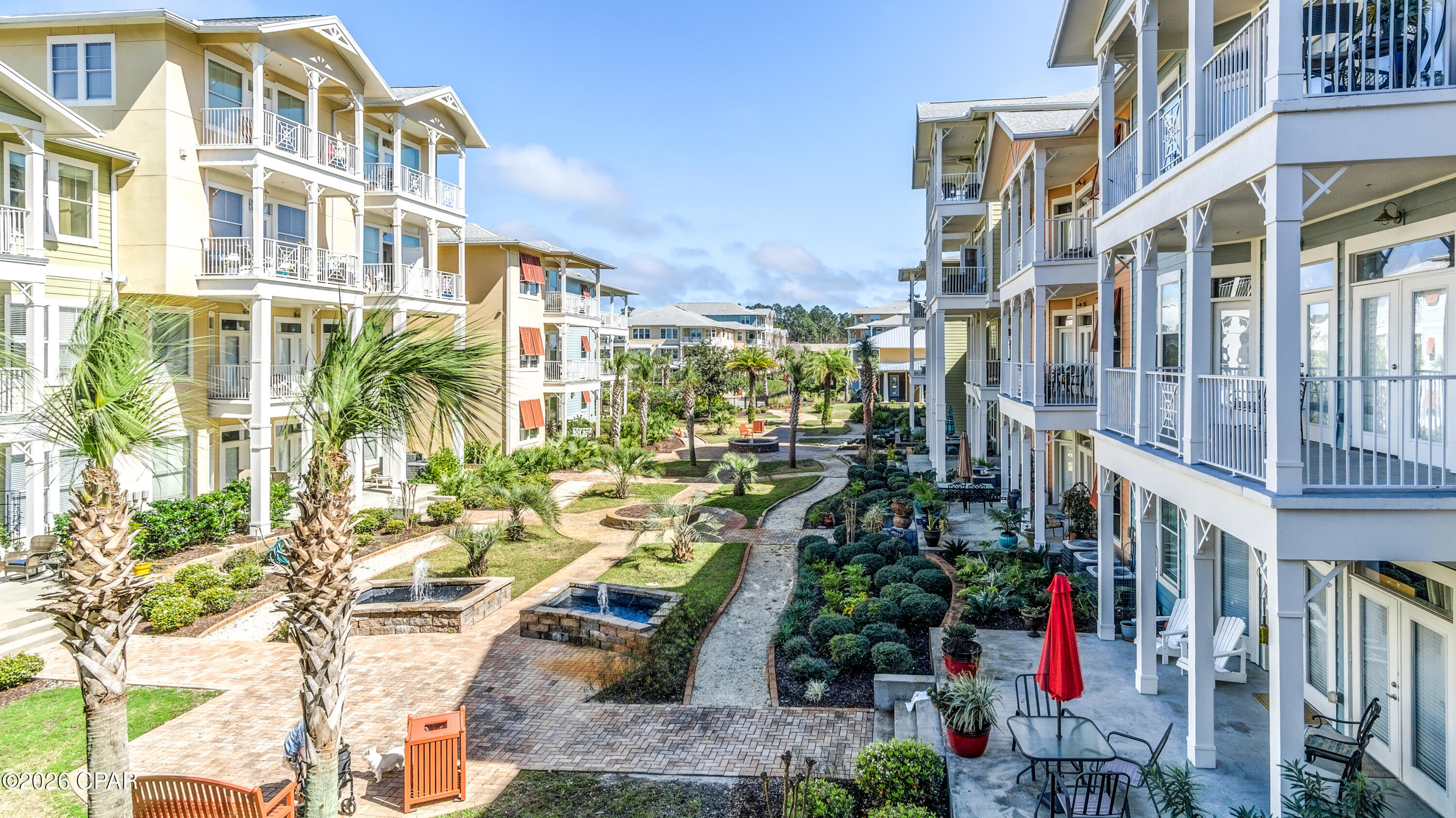 Welcome to Island Reserve and this fully equipped 1-bedroom, 1-bath condo, with 1,071 square feet of living space, offering a remarkably spacious, upscale, resort-style living experience. Overlooking the beautiful courtyard, this well-maintained condo features 10-foot ceilings, crown moldings, granite countertops, wood and tile flooring, including a large bonus room or den ideal for a home office, media room, or guest nook. The kitchen area is designed with an open-concept layout that integrates seamlessly into the main living and dining spaces.

This highly sought-after residential community is loved for its peaceful atmosphere, resort-style amenities, and true neighborhood feel. Short term rentals are prohibited, ensuring a quiet, residential atmosphere year-round. The multi-level parking garage allows you to park on the same floor as your unit, eliminating the need for stairs or elevators. Offering a strong social club with community events, steps away from the 1-acre tropical lagoon pool with waterfalls, indoor basketball/pickleball courts, fitness center, game room and gated security. Located just 1.4 miles from the sugar-white sands of Panama City Beach and minutes from the Hathaway Bridge, Island Reserve offers the perfect blend of tranquility and convenience. 

The unit comes furnished or unfurnished, buyer's preference.