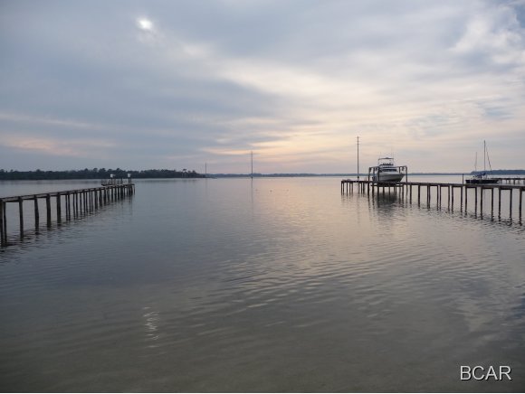 ON THE WATER!!  

Beautiful view from the Balconies. Recently remodeled 3 bedrooms and 2 1/2 baths. Top floor is large open great room/kitchen with balcony and large sliding glass to doors to take advantage of the view. Large master bedroom with its own balcony overlooking the bay. Large finished area on bottom floor can be used for storage or a rec room. 2 car garage with opener. This is a MUST SEE******NO SMOKING and NO PETS*****