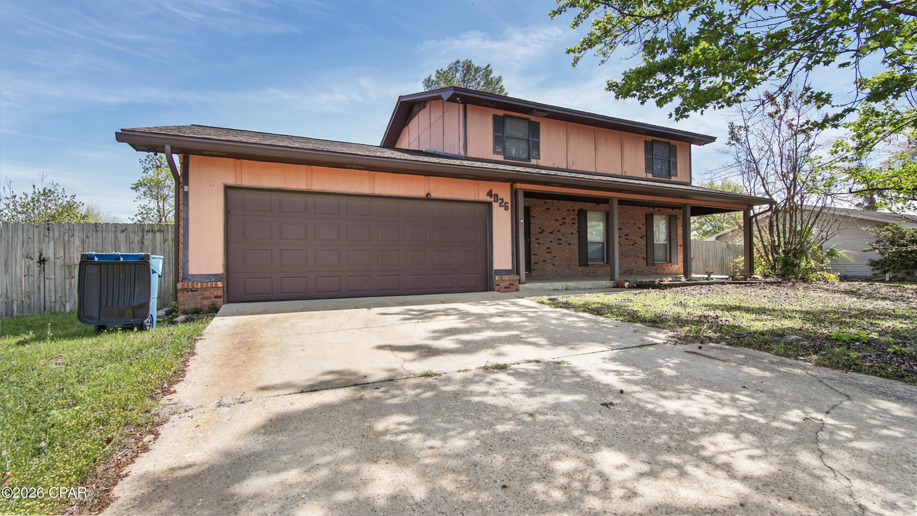 Spacious two-story home located in the established Venetian Villa neighborhood in central Panama City. This 4-bedroom, 2.5-bath home offers approximately 2,130 heated and cooled square feet with a functional floor plan that includes a sunken family room with fireplace, formal dining area, and multiple living spaces. The layout features the main living areas on the first floor and all bedrooms on the second floor, providing separation and flexibility for everyday living. The property sits on a generous residential lot with a fenced backyard and attached garage. Conveniently located near schools, shopping, restaurants, and major roadways, this home offers a great opportunity for buyers looking for space and the chance to personalize a property in a well-established neighborhood.