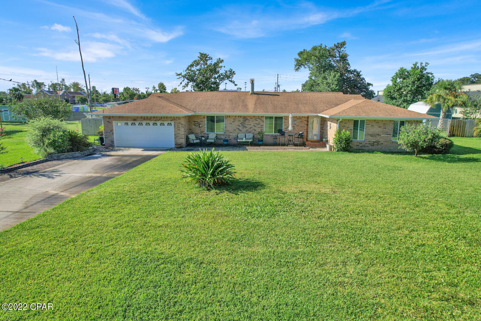 BACK ON MARKET. NO FAULT OF THE SELLER. THIS IMMACULATE HOME IS ALL ABOUT THE LOCATION & PROPERTY CONDITION. LOCATED JUST A FEW BLOCKS FROM THE BAY. A SHORT DRIVE TO THE VERY POPULAR ST. ANDREWS WHERE YOU CAN DINE, SHOP AND LAUCH YOUR BOAT FOR THE DAY. YOU ARE ALSO CLOSE TO THE BEACH, COLLEGE AND ALL SHOPPING ON 23RD STREET. THE KITCHEN IS NEWLY REMODELED WITH UPGRADED APPLIANCES, CABINETS AND GRANITE COUNTERTOPS. OFF THE KITCHEN IS THE SPACIOUS LAUNDRY ROOM AND OFFICE. LOCATED ON THE OTHER WING OF THE HOME THERE IS A LIVING ROOM/ DINING ROOM WITH A FAMILY ROOM SEPERATED WITH A BEAUTIFUL DOUBLE SIDED FIREPLACE. THERE IS A 21X16 SCREEN ROOM THAT IS AN EXTENSION OF THE LIVING ROOM THAT IS PERFECT FOR ENTERTAINING. THE  BEDROOMS ARE SPACIOUS AND EACH BEDROOM HAS A FULL BATH ATTACHED.. MASTER IS LARGE AND HAS 2 SEPERATE  ENRTY WAYS BACKYARD IS LARGE. TOTAL YARD IS AN 1/2 ACRE. THE SIDE YARD HAS PLENTY OF SPACE FOR A LARGE BOAT/ MOTORHOME/ RV. THERE ARE ALSO 2 IMMACULATE STORAGE BUILDINGS IN THE YARD, THERE IS AN IRRIGATION SYSTEM, STORM SHUTTERS, SPRINKLER SYSTEM, CULLIGAN  TANK, FIRE PIT FOR FALL EVENINGS. PLEASE VERIFY ALL IMPORTANT INFORMATION. CALL FOR YOUR PRIVATE SHOWING.