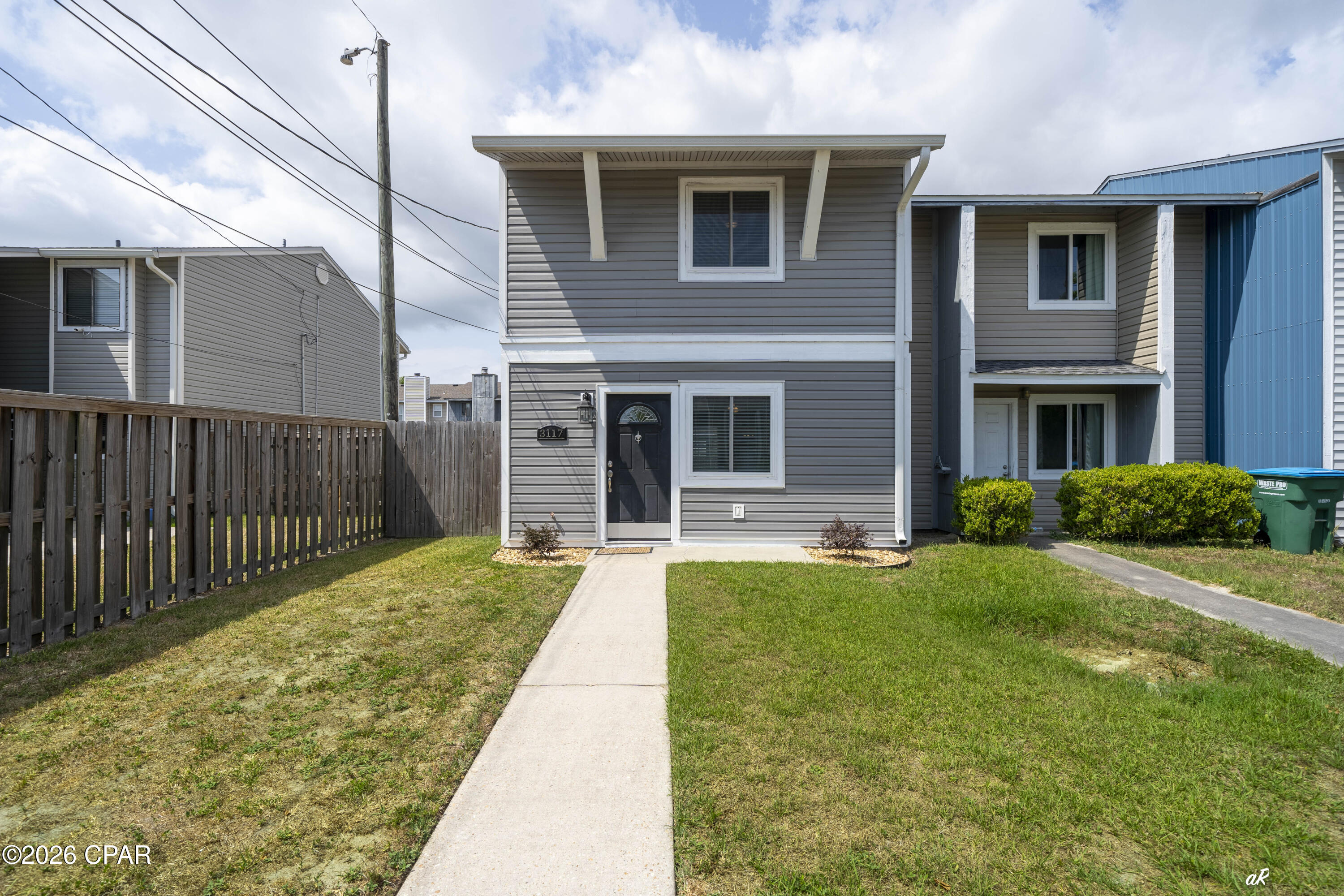Updated, End Unit, gated backyard and additional privacy! Move in ready, this 2 bedroom, 1.5 bath townhome at 3117 Debra Blvd offers the flexibility buyers are looking for, whether as a primary residence, second home, or income producing investment. Inside, you will find tile flooring throughout the first floor and updated LVP upstairs, along with renovated bathrooms and a clean, modern feel from top to bottom. The kitchen features stainless steel appliances, making it both functional and appealing. Step outside to enjoy a covered back porch and a balcony overlooking the fully privacy fenced backyard, ideal for relaxing, entertaining, or letting pets roam. With strong potential for both long term and short term rental income, this one is ready to go from day one.