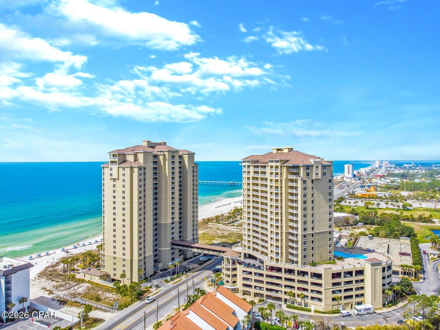 Professional Interior Pictures coming soon!  Welcome to Grand Panama Beach Resort Unit 2-505! This beautifully furnished 2-bedroom, 2-bath condominium offers 1,135 square feet of coastal comfort with beautiful Gulf views in one of Panama City Beach's premier beachfront resorts.
The open-concept floor plan is designed for effortless beach living, featuring a spacious living area that flows seamlessly into the dining room and well-appointed kitchen. Step onto your private balcony and enjoy the refreshing Gulf breeze while taking in the beautiful water views.
This move-in and rental-ready unit has been thoughtfully updated with a 6-month-old water heater, new television, new sofa, and new bar stools, creating a fresh and inviting coastal atmosphere. The spacious primary suite includes a private bath, while the guest bedroom and second full bath provide comfort and privacy for family and friends. Being offered fully furnished, this condominium is ready for immediate enjoyment or income-producing vacation rentals.
Grand Panama Beach Resort is known for its outstanding amenities, including two resort-style pools, hot tubs, a fitness center, grilling areas, covered parking, and convenient beach access via a private skybridge. Ideally located near Pier Park, dining, shopping, entertainment, golf, and the sugar-white beaches of the Emerald Coast, this property offers the perfect combination of relaxation and investment potential.
Whether you're looking for a primary residence, a vacation getaway, or a proven investment opportunity, Grand Panama Beach Resort Unit 2-505 is ready to welcome you to the beach lifestyle you've been dreaming of.