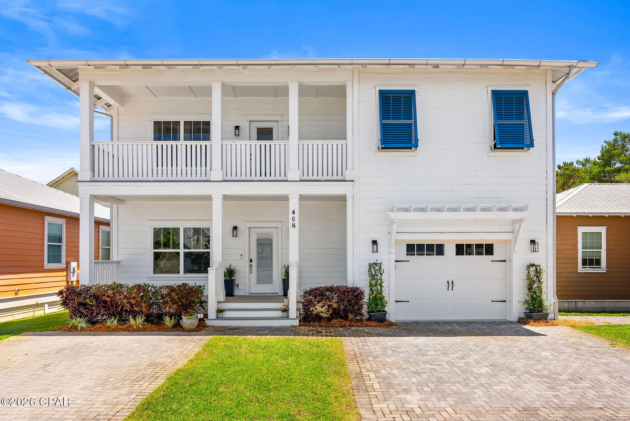 Charming beach cottage offering the perfect blend of coastal living, modern upgrades, and energy-efficient features.  Located within a gated community featuring a resort-style pool, two dog parks, and a children's play area, this beautifully maintained home combines classic beachside charm with exceptional neighborhood amenities. This home embraces classic beachside charm with thoughtful enhancements designed for comfort, convenience, and long-term savings.

From the moment you arrive, you'll notice the well-kept exterior complete with rain gutters and hurricane shutters, providing both curb appeal and peace of mind. A deep water well services the yard irrigation system, allowing you to maintain a lush landscape without impacting your utility costs--keeping the water bill at approximately $100 per quarter.

Inside, the home features a functional and inviting layout with the primary suite conveniently located on the main level, offering privacy and ease of access. The master suite serves as a relaxing retreat, complete with a fully renovated bathroom completed in December 2025, featuring updated finishes and a fresh, modern feel.

Upstairs, you'll find four additional bedrooms along with a spacious second living area, providing ample room for family, guests, or flexible use such as a media room, playroom, or home office. The upstairs bathrooms were upgraded in 2023, with beautifully tiled showers and sleek glass doors.

The home has been further enhanced with hardwood flooring installed in September 2025 throughout the primary bedroom and all upstairs bedrooms, adding warmth and durability. Upgraded closet systems in the primary suite and two additional bedrooms provide efficient and stylish storage solutions.

The kitchen is equipped with brand new Samsung Bespoke appliances installed in September 2025, including a refrigerator, oven, and dishwasher, offering both modern design and reliable performance. A RainSoft water softening system, oxygen water system for the washing machine, and reverse osmosis filtration at the kitchen sink and refrigerator ensure high-quality water throughout the home. The washer and dryer are also included for added convenience.

Energy efficiency is a major highlight, with solar panels and a Tesla battery backup system significantly reducing utility expenses. With use of the battery system, the electric bill averages approximately $60 per month. Additionally, the garage is equipped with a 240-volt outlet for electric vehicle charging, making it ready for a Tesla or other EV.

Step outside to enjoy your private hot tub, perfect for unwinding after a day at the beach or entertaining guests year-round. This outdoor feature enhances the home's relaxing coastal lifestyle.

With extensive upgrades, a versatile floor plan, and cost-saving features already in place, this beach cottage stands out as a move-in ready opportunity. Whether you're seeking a full-time residence or a second home this home delivers comfort, efficiency, and coastal charm in one exceptional package.
