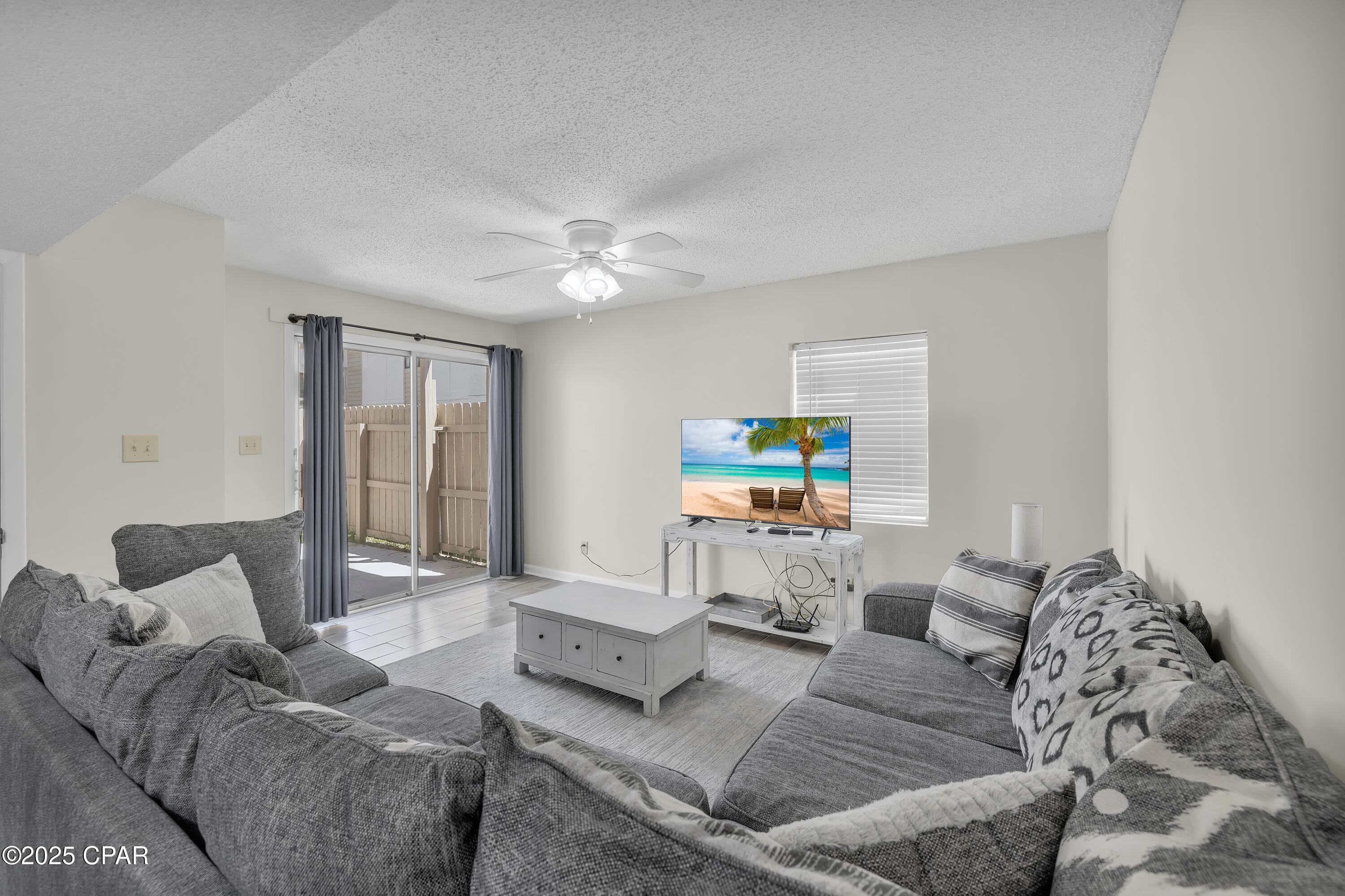 JUST RENOVATED. PRIVATE BALCONIES. COVERED PARKING. Welcome to Horizon South 7A-3, a fully updated 2-bedroom, 2.5-bathroom townhome in one of the most amenity-rich communities on the west end of Panama City Beach. This freshly renovated corner unit includes an assigned covered parking space and is ideally positioned near the community amenities. Inside, you'll find wood-look tile flooring throughout the main level, brand-new carpet upstairs, and updated kitchen and bathroom cabinetry with sleek quartz countertops. The kitchen also features new stainless-steel appliances. Both bedrooms include private en-suite bathrooms and individual balconies, offering a peaceful retreat for guests or family members. The spacious corner balcony provides an expanded outdoor living space with a view toward the amenities area. 

Horizon South is a gated, golf-cart friendly community located just minutes from Pier Park, Topgolf, the airport, McGuire's Irish Pub, and Dolly Parton's Pirates Voyage Dinner & Show.  Community highlights include four pools (one heated seasonally), a kiddie pool, hot tub, tennis and pickleball courts, shuffleboard, mini golf, a game room with billiards, event space, on-site laundry, and more. Owners are welcome to bring pets, and the HOA dues ($636/month) cover water, sewer, internet, trash, grounds maintenance, building insurance, and security. Buyer to verify all information if important.