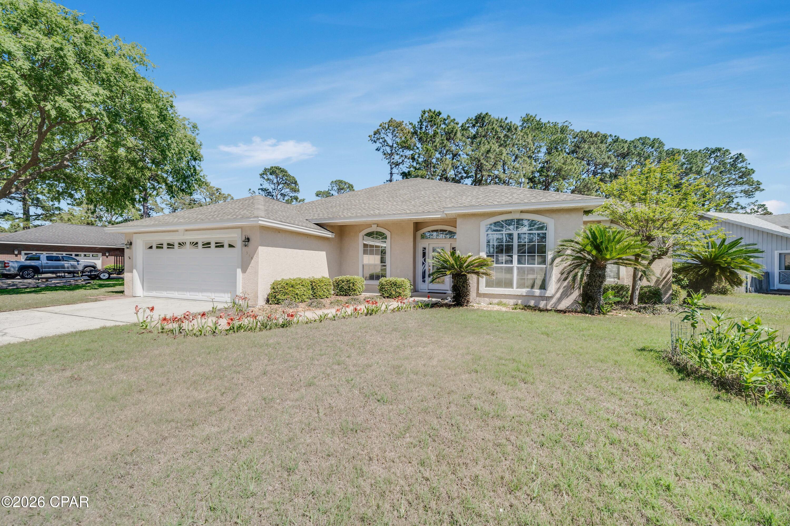 PRICE REDUCTION OF OVER 30K AND STILL COMES WITH 15K SELLER CREDIT. SOUGHT AFTER COLONY CLUB HOME BACKS UP TO LEGACY GOLF COURSE WITH ENCLOSED IN-GROUND POOL! NO HOA! This very open and airy 4/2 home has a split bedroom plan with high ceilings and crown molding through out. Beautiful big windows ensures plenty of light. Master bedroom has walk in closet and boasts a huge master bath with jacuzzi tub and large shower. Real bamboo floor in the living room, tile in the kitchen and hallways, and carpets in the bedrooms. Only 1 mile from the sandy beach. New roof in 2023, energy efficient geothermal HVAC installed 2 years ago and the pool was re-lined last year. Comes with irrigation system with shallow well and pump. Backyard backs up to the beautiful Legacy golf course and neighborhood has underground utilities. Washer/Dryer and extra Refridgerator conveys. All measurements are approximate and buyer should verify.