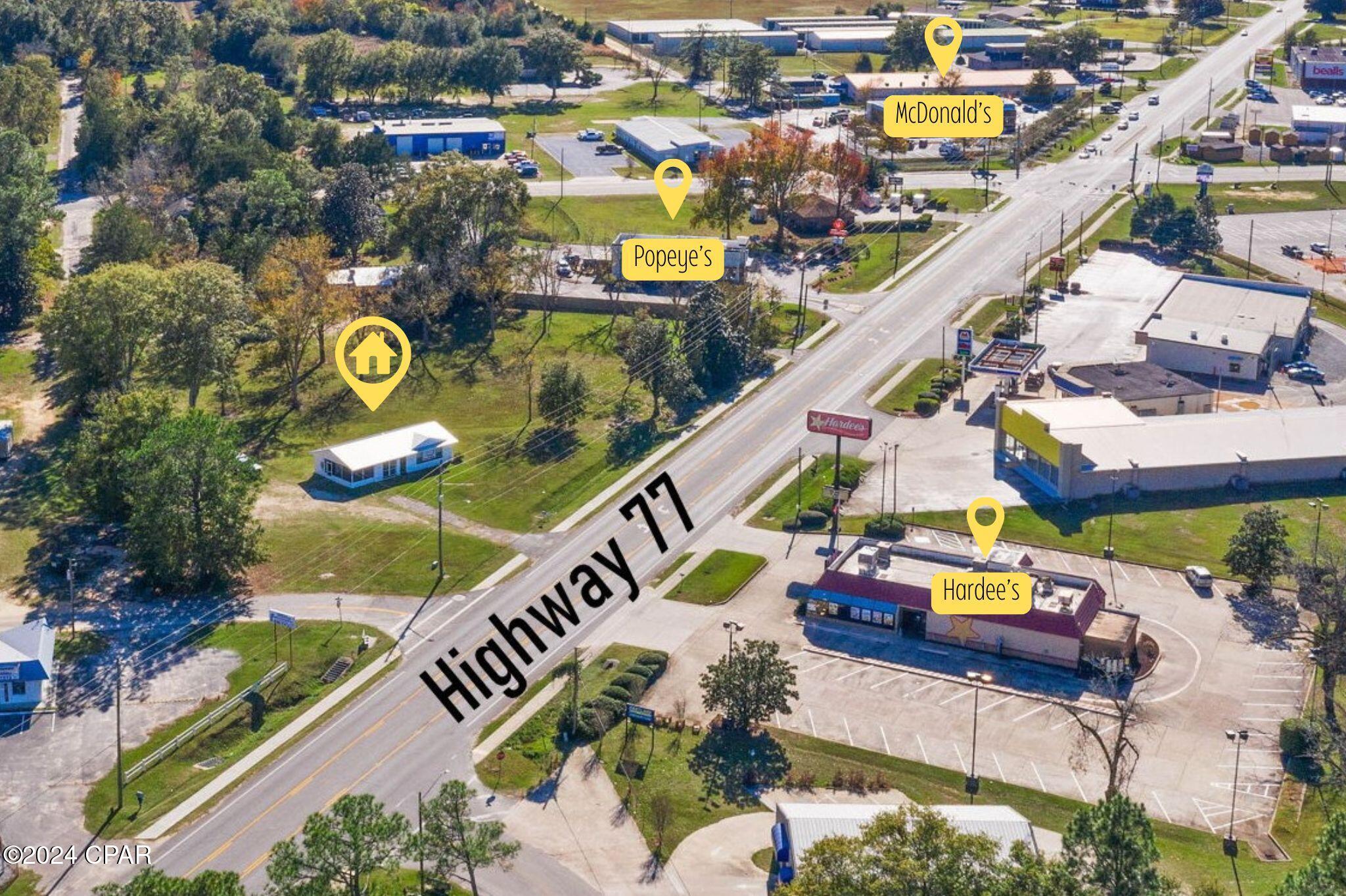 Take advantage of this prime opportunity to showcase your business in a high-visibility location! Situated on 0.64± acres with prominent frontage along Hwy 77, this property boasts excellent exposure and a robust average daily traffic count of 14,500 (2023 DOT data). The adaptable design of the building suits a variety of business types, including retail, professional offices, or service-oriented enterprises. With its sought-after location and substantial highway frontage, this property is perfectly positioned to capture both foot and vehicle traffic. Secure this ideal spot for your business today!
