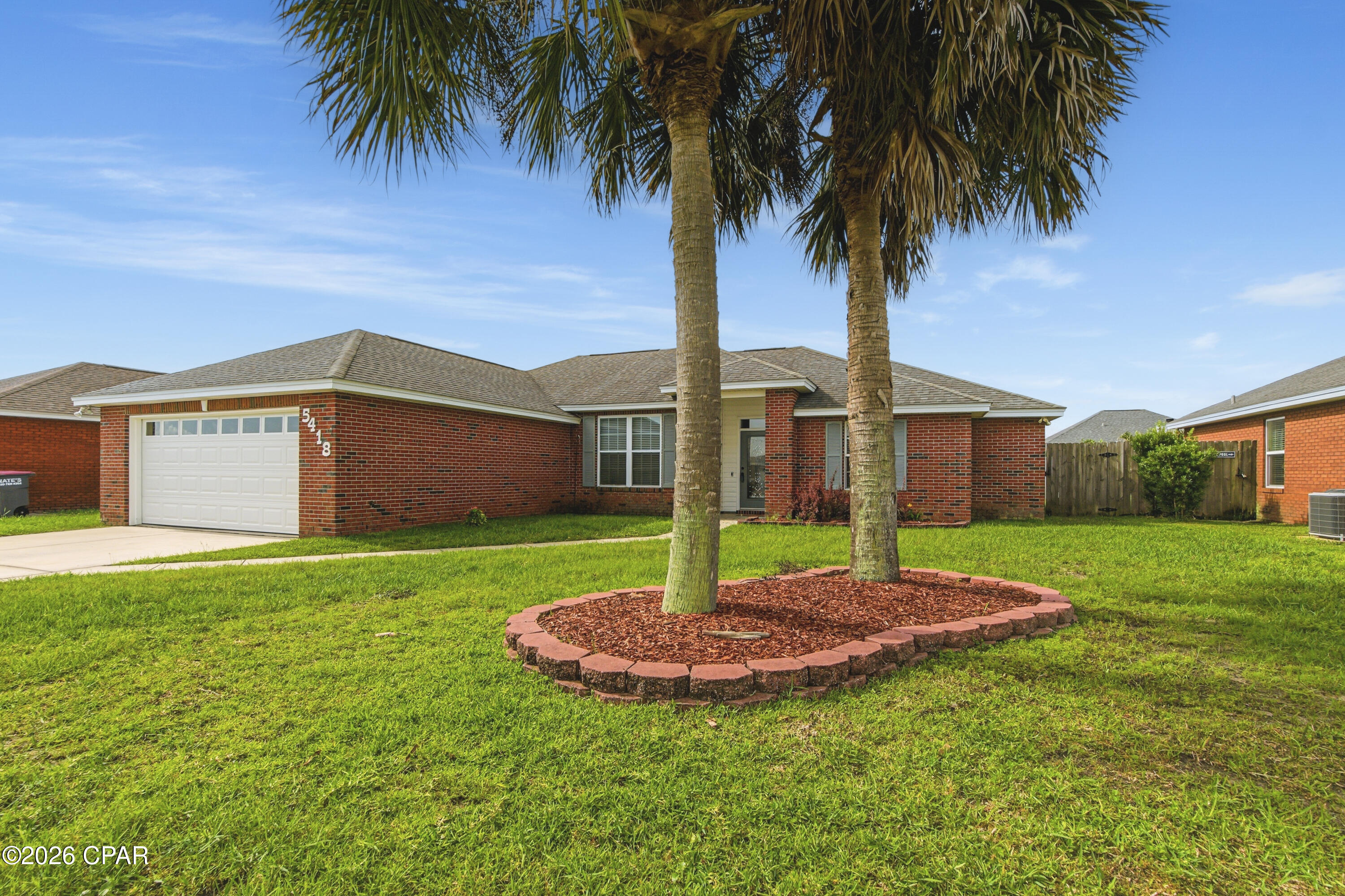 Located in the desirable Cherokee Heights neighborhood just off Hwy 231 and Star Ave, this 3BR/2BA home is close to schools, shopping, and a short drive to Tyndall Air Force Base. Publix and Starbucks are just 1.5 miles away, and the Elementary and Middle schools are only 2 blocks from the home.

The open floor plan features high ceilings, an electric fireplace, and a spacious kitchen and dining area. Bamboo Plank and Tile Flooring run throughout, with carpet only in the bedrooms.
The split-bedroom layout offers privacy in the primary suite with double vanities, a jetted soaking tub, separate shower, and large walk-in closet. Bedrooms 2 and 3 also have walk-in closets. Outside, enjoy a Privacy-Fenced backyard with a Covered Porch, Garden Beds, and a Shed.  Also aAdditional features include a 2-car garage, Stove, and Roof, HVAC, and Water Heater all approximately 7 years old. No HOA fees!