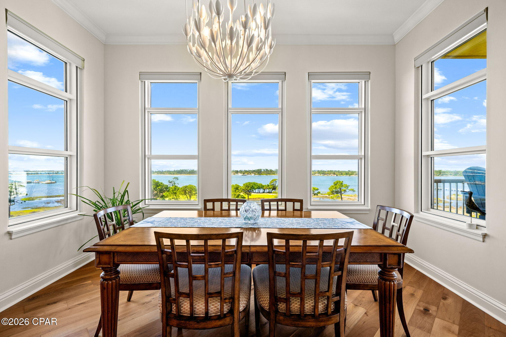 Discover the ultimate in luxury coastal living at this rare 7th-floor, 3-bedroom, 3-bath open floorplan condominium in the prestigious Grand Residences located within the exclusive and gated Bay Point Golf & Marina Resort.
This exceptional condo features 10 ft ceilings with expansive windows, crown molding, and a wrap-around balcony. It has new stainless appliances, updated lighting and fans, Levolor motorized  blinds throughout, new high-efficiency HVAC and water heater, and a new oversized stackable washer/dryer. The master bathroom has undergone a complete transformation with tiled shower, upgraded fixtures, frameless shower doors, and new LED lighting, The furniture, electronics, and furnishings throughout this condo are top-of-the line and most will convey.
From your expansive wrap-around balcony, you overlook the Jack Nicklaus golf course, the Grand Lagoon waterway, St Andrews State Park, Shell Island, and even views out to the Gulf!  You can soak in all of the amenities of this resort which include a spectacular heated swimming pool and lanai, jacuzzi, fire pit, grilling area with a smoker, fitness center, and billiards/ping pong tables, and golf cart parking,  It is ideally located within minutes of the World's Most Beautiful Beach, next door to a full-service spa, and only steps to the new Point South Marina, which has slips for vessels up to 120 feet.  All of this translates into a luxury coastal lifestyle unlike any other in Panama City Beach.
Additionally, this condominium comes with a deeded covered parking space and a climate-controlled storage unit located just outside the 7th floor elevator doors.
Schedule your showing today. All information deemed reliable but not guaranteed.