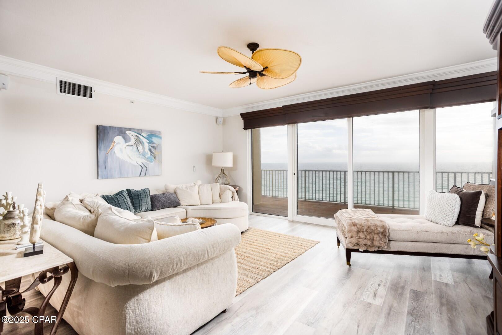 Motivated Seller!! Welcome to Grande Surf Club Condominiums Unit 6W, your gateway to coastal living! This fully furnished three bedroom, two bathroom luxury condo spans 1,783 square feet and offers upgraded bathrooms, kitchen, and living areas for your comfort. Step out onto the large 400 sqft wraparound balcony and marvel at the breathtaking sunset views while you unwind or entertain guests. With the private beach access, you can easily relax by the shore or take a short walk to enjoy Panama City Beach's many attractions. After a day of sun and sand, retreat to the community pool for a refreshing dip or simply soak up the sunshine poolside. With a deeded covered parking spot included, convenience and privacy is always at your fingertips. Experience the best of coastal living at Grande Surf Club Condominiums Unit 6W. Schedule your viewing today and make your dream of beachside living a reality!