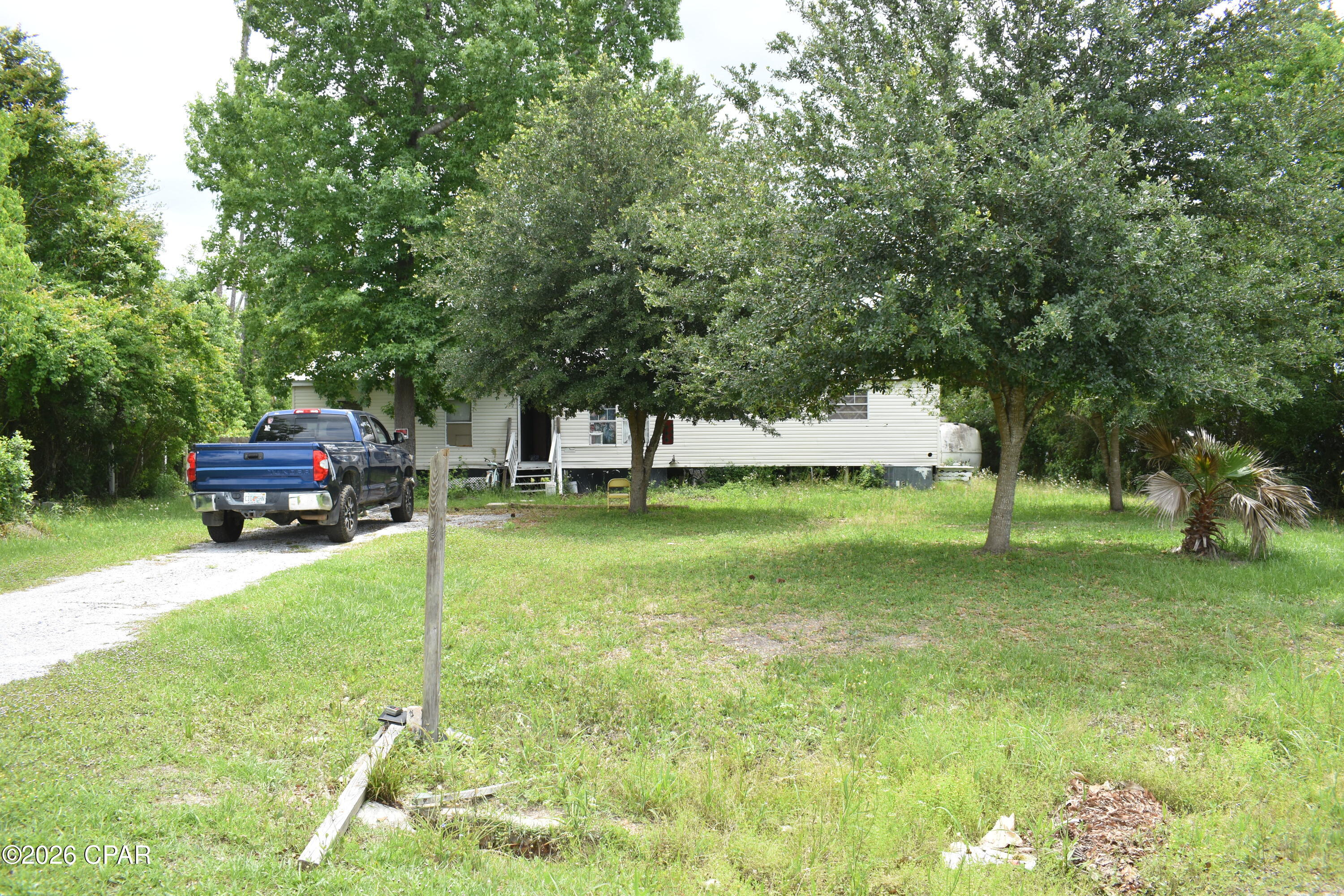 9212 Doe Circle is a great opportunity for an investor to buy low, make some repairs and either have a great 4 bedroom 2 bath rental property or sell it for a nice profit.   While it needs some floors, paint and an AC unit.  It has a metal roof (2019) and is a on a quiet cul-de-sac with municipal water supply, underground utilities.  The property is surounded by privacy creating hedges and has plenty of room for more improvements.  This is an AS IS offering.
