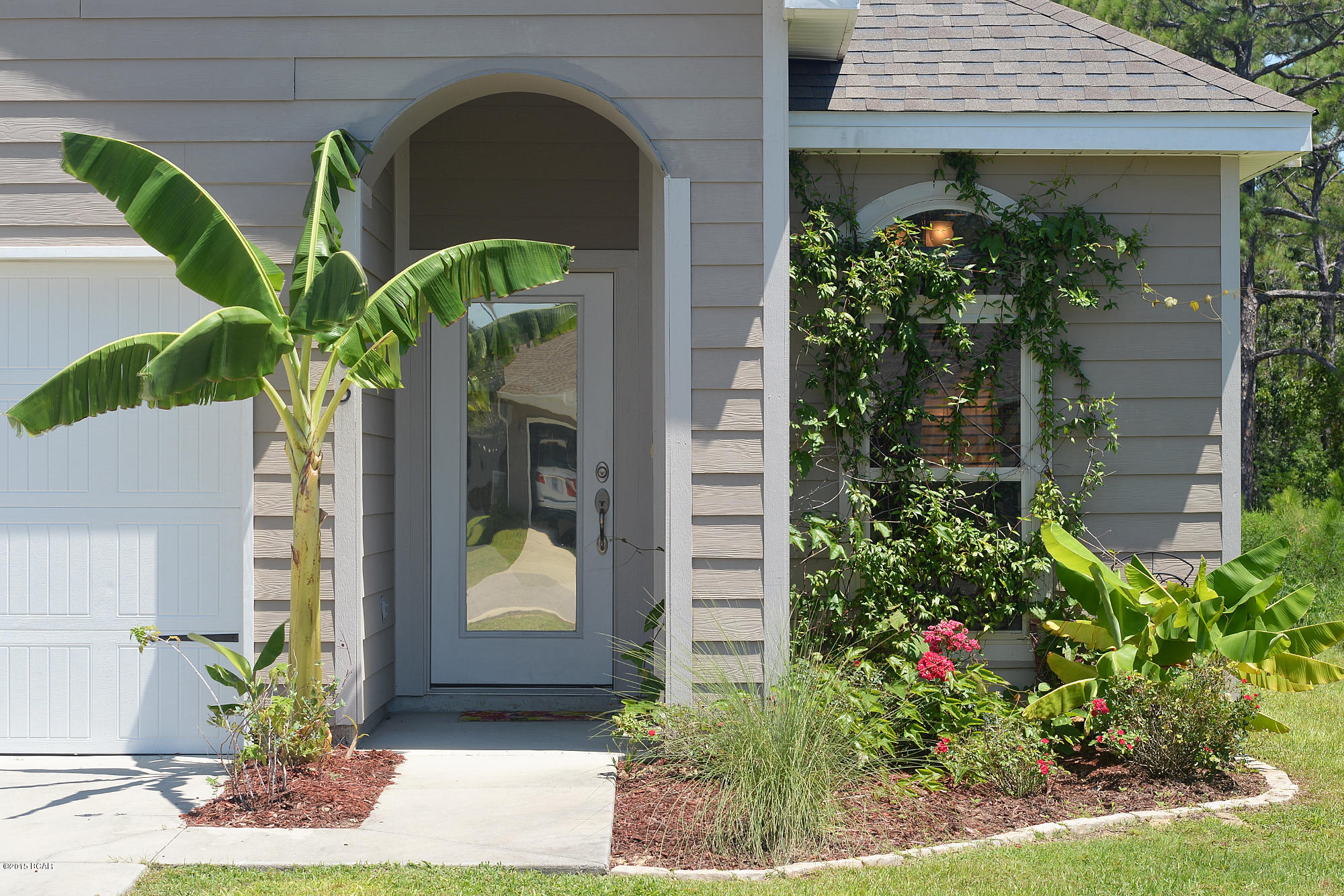 **CLOSE TO THE BEACH AND CLOSE TO PIER PARK**  What a price for this much house!  Featuring 3 bedrooms and 3 full baths AND a huge bonus room on the second floor, this certainly will be a deal for someone.  It is only 3 years old highlighted by beautiful granite countertops and stainless steel appliances.  The main room is large and spacious and bedrooms are large as well.  Also, the owner has added tint to the windows for lower electric bills.  Call today for more details...ELIGIBLE FOR 100% FINANCING!