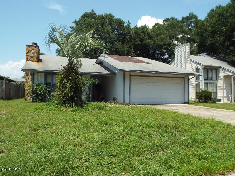 REDUCED!!!  Three bedroom two bathroom contemporary house with two car garage, near Tyndall Air Force Base and Wal Mart offered as is.  The home features a fireplace, Florida room and shed. All sizes approximate please verify if important.