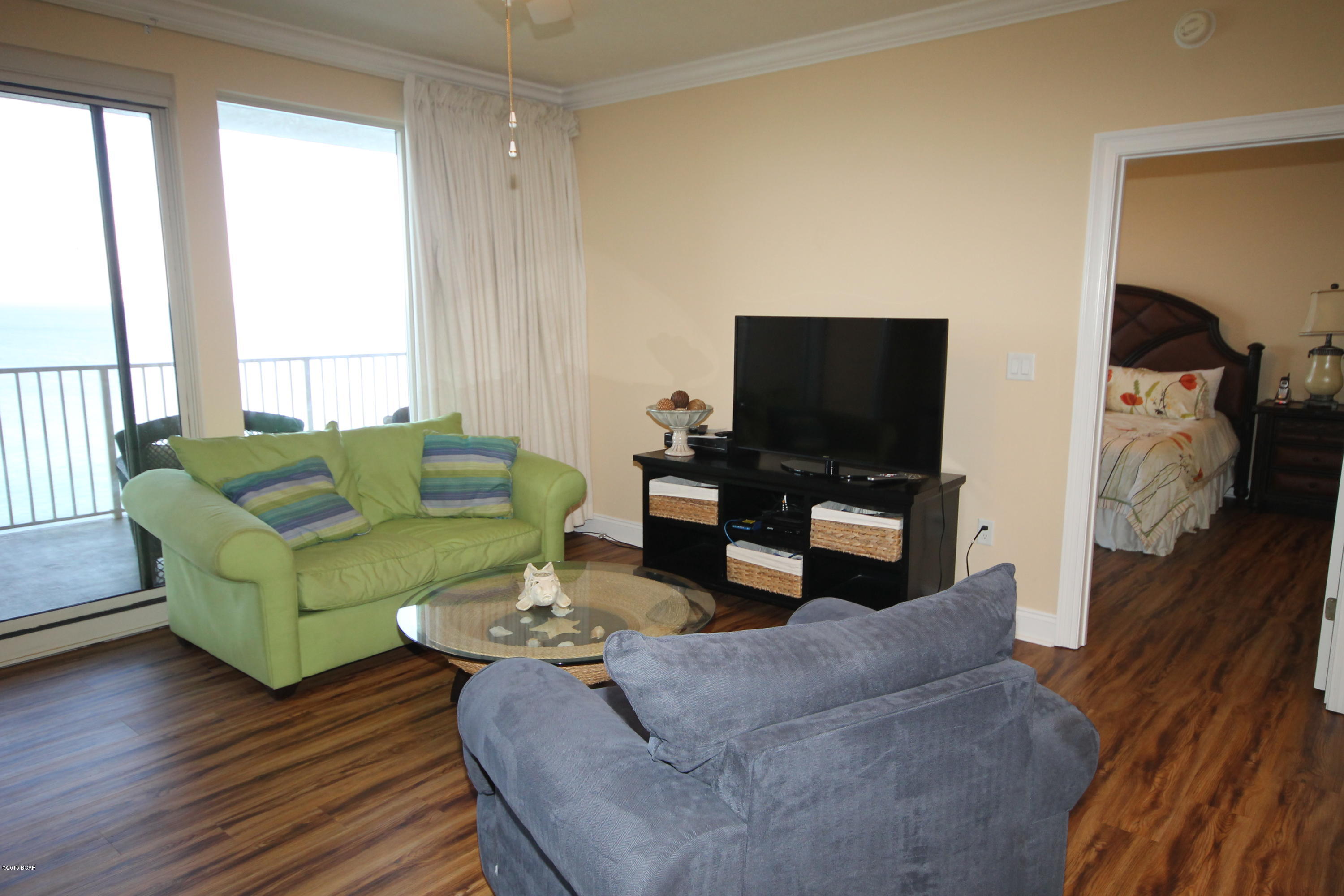 This 11th floor unit has a top of the line furniture package.   Located on the much desired Thomas Drive within walking distance of Saint Andrews State Park. Within walking distance of fine restaurants, nearby fishing, amusement attractions and golf. Treasure Island offers a beautiful unobstructed view of the coastline while sitting on your balcony or relaxing in your unit. From your front balcony you can enjoy the breathtaking view of the beautiful Saint Andrews Park.You can enjoy watching the fishing boats and ships going through the Pass while you relax on your large front balcony. Full glass views across the back of the units will allow you to have a breathtaking view of the beautiful sunsets, emerald water, and sugar white sandy beaches.