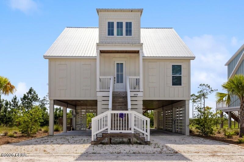 Coastal living at its finest + seller is offering $5,000 closing cost assistance! This spacious, move-in/ rental ready 4 bedroom 4 bath home offers an open floor plan with fabulous, unobstructed  Bay views ( amazing sunsets) from several bedrooms, multiple decks, the bonus room upstairs and the living room. This home also boasts 10 foot ceilings, eight foot doors, hard surface countertops, SS appliances, along with double sinks and a soaker tub in the owners suite. There are also an abundant number of upgrades including  a six burner gas stove with a custom hood vent, shiplap, built-ins, water softener with purifier,  under-house storage, cabinetry upgrades with gold pulls, gold kitchen faucet,  beautiful lighting and new fans though out. Shallow Reeds also offers a community boardwalk with Bay access and more views. It is close to beaches, restaurants, the marina, downtown and more. This home will make a  great primary home, secondary home, or income producing property.