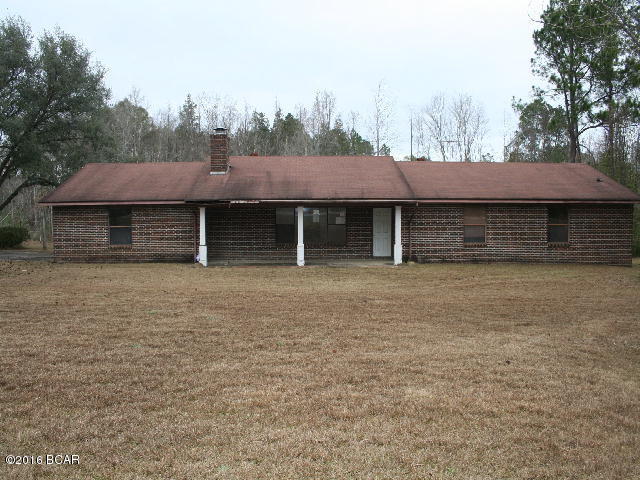 * PRICE REDUCED* Large brick home in the country on 2.01 acres. If you need lots of room this is it! Home has 4 bedrooms 2 and 1/2 baths. The large room where the 1/2 bath is located would be perfect for a hobby room, guest room or an office. There is a large brick workshop with lots of shelves. The large lot is on a corner facing Gardenview which is a paved road and corners Mill Rd. a graded county road.There is room here for a garden and animals. There is some fencing in place and there is even a small pond on the property!