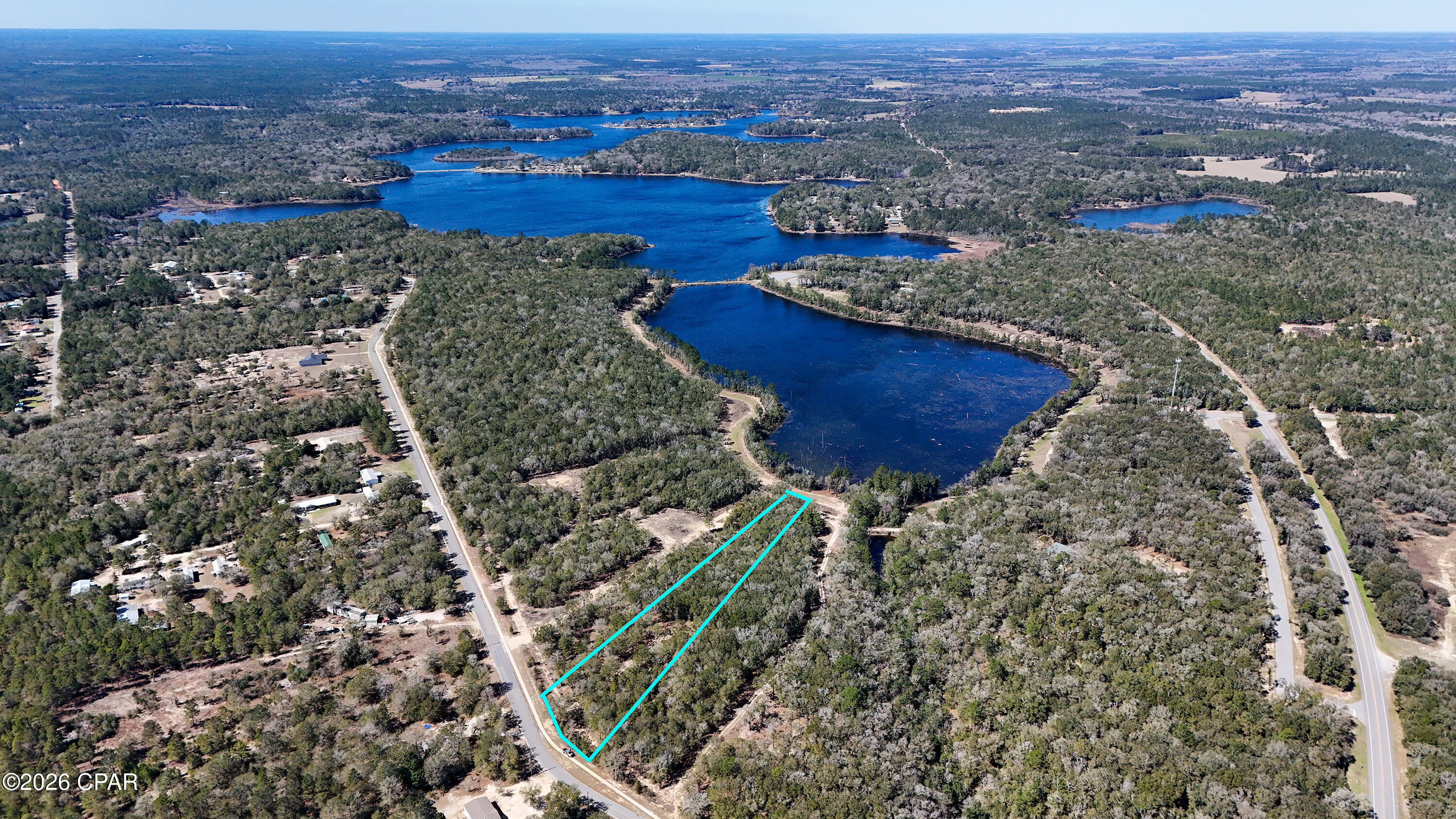 FOR SALE - Large 2.54 Acre Luxury Lakefront Lot in Seacoast Estates - Located on Seacoast Lake in DeFuniak Springs, FL. This stunning   Lakefront Lot is one of the Largest Lots and it is Priced to sell!! All Lots in Seacoast Estates are in an X Flood zone, so you can have peace of mind in building your home.   Recently cleared land by the lake allows you to see what your views will be like in your custom built home. Seacoast Estates is Northwest Florida's newest exclusive residential community on a 43+ acre Lake. This lot offers a rare opportunity to build your dream home on a serene, expansive homesite with direct views of Seacoast Lake. Short Term Rental are allowed for the main dwelling. Conveniently located close to I-10 for easy access to Tallahassee or Crestview. Less than 5 miles from DT DeFuniak Springs.  Located only 35 miles from the Sugar white Beaches of the Emerald Coast. Enjoy the freedom to build your own private dock and fully enjoy lakefront living. Priced to sell don't miss this exceptional opportunity