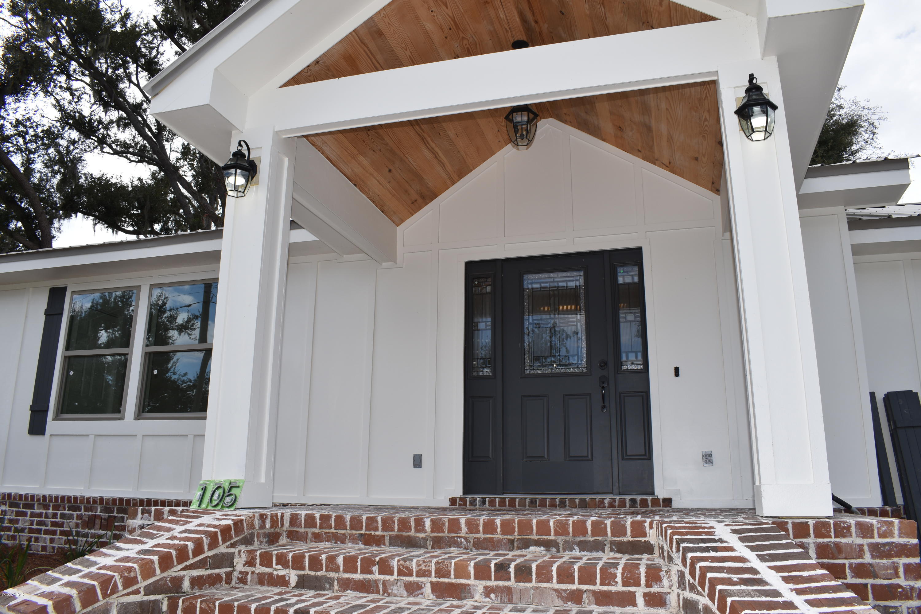 Imagine yourself calling this beautiful house your HOME!  The owners have lovingly refurbished this historic Cove home from the studs out to create this beautiful, inspiring space.  This home has FIVE bedrooms, as well as an office space and a large open living and dining area featuring a modern kitchen with marble countertops, a large island with a farmer sink, and beautiful touches such as cedar plank shelving on the original brick inner walls. Master bedroom has plenty of walk-in closet space, master bath features a beautiful soaking tub AND a separate shower.   This home also has an energy efficient heat producing electric fireplace with media outlets above the mantle that offer TV viewing from the entire open living space. The back yard is still being constructed, but will be large and open with privacy fencing.  This home is conveniently located near TAFB and downtown Panama City, also near schools churches and parks.  Application required prior to showing. $200 non-refundable pet fee per pet.  Please contact listing agent TODAY for more details.