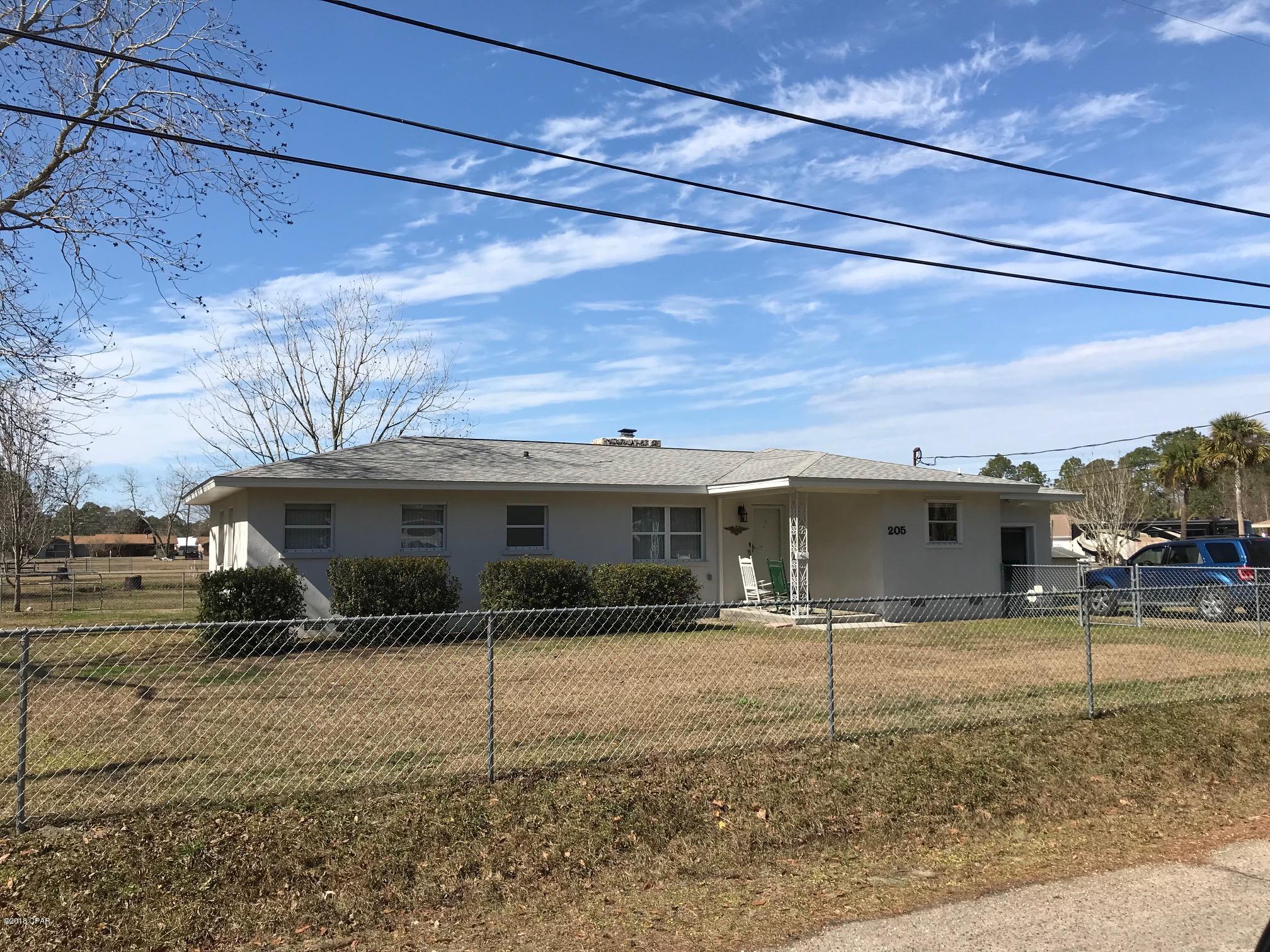 Well kept Florida style cottage located in Callaway. Short distance to TAFB.  Large chain link fenced lot, one car garage, with parking for 2 in the drive way. This home features lots of tongue and groove wood accents, large updated walk in shower and very large walk in closet in the master bathroom.