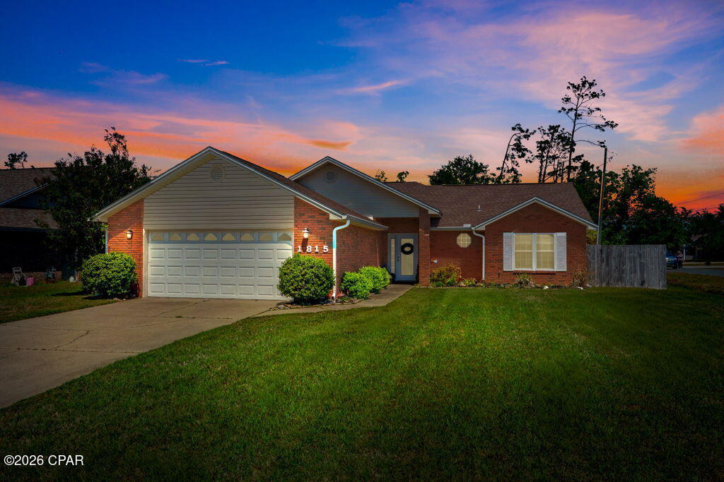 **Back on the Market due to No Fault of the Seller**

Welcome to 1815 Bowman Lane in Lynn Haven, where comfort meets lifestyle. Located on a corner lot within a quiet cul-de-sac in Britton Woods, this home offers a rare combination of privacy, outdoor living, and functional space in one beautifully maintained property.

A large, welcoming foyer sets the tone as you enter, leading into a bright and inviting layout featuring high ceilings, custom crown molding, and beautiful custom window treatments that elevate the space throughout. 

The enclosed Florida room provides flexible space for a second living area, office, or relaxing retreat, while the kitchen flows seamlessly into the main living areas--ideal for both entertaining and everyday living.

The split floor plan offers privacy for the primary suite, complete with a huge walk-in closet and a spacious, updated primary bathroom, while additional bedrooms provide flexibility for family, guests, or work-from-home needs. The home also features a generously sized laundry room with a built-in office nook, adding valuable functionality.

Step outside to your private backyard retreat featuring a saltwater splash pool, a screened-in patio with a hot tub that conveys, and a storage building with electricity--perfect for hobbies or additional storage. Double gate access, made possible by the corner lot, allows for easy boat or RV storage. The backyard backs up to a wooded area, providing added privacy, and includes a sprinkler system on a separate irrigation meter for efficient lawn care.

For added peace of mind, both the roof and HVAC were replaced in 2019.

Conveniently located near schools, shopping, dining, and just a short drive to the beaches, this home offers both convenience and lifestyle in one of Lynn Haven's most desirable areas.