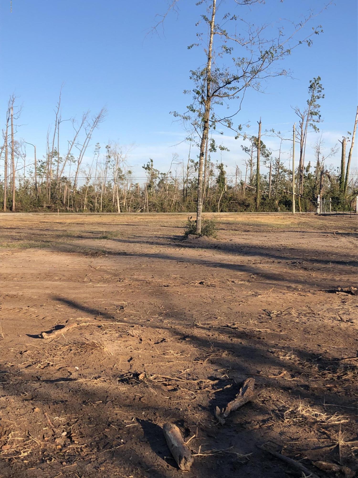 Approximately 1.5 miles North of Lynn Haven!  One of Two Large lots on paved road, .81 acres each! Completely cleared, high and dry, driveway already in place, ready to build!  Contact your agent and come make your choice today! Public water available, electric and phone lines available at the road.