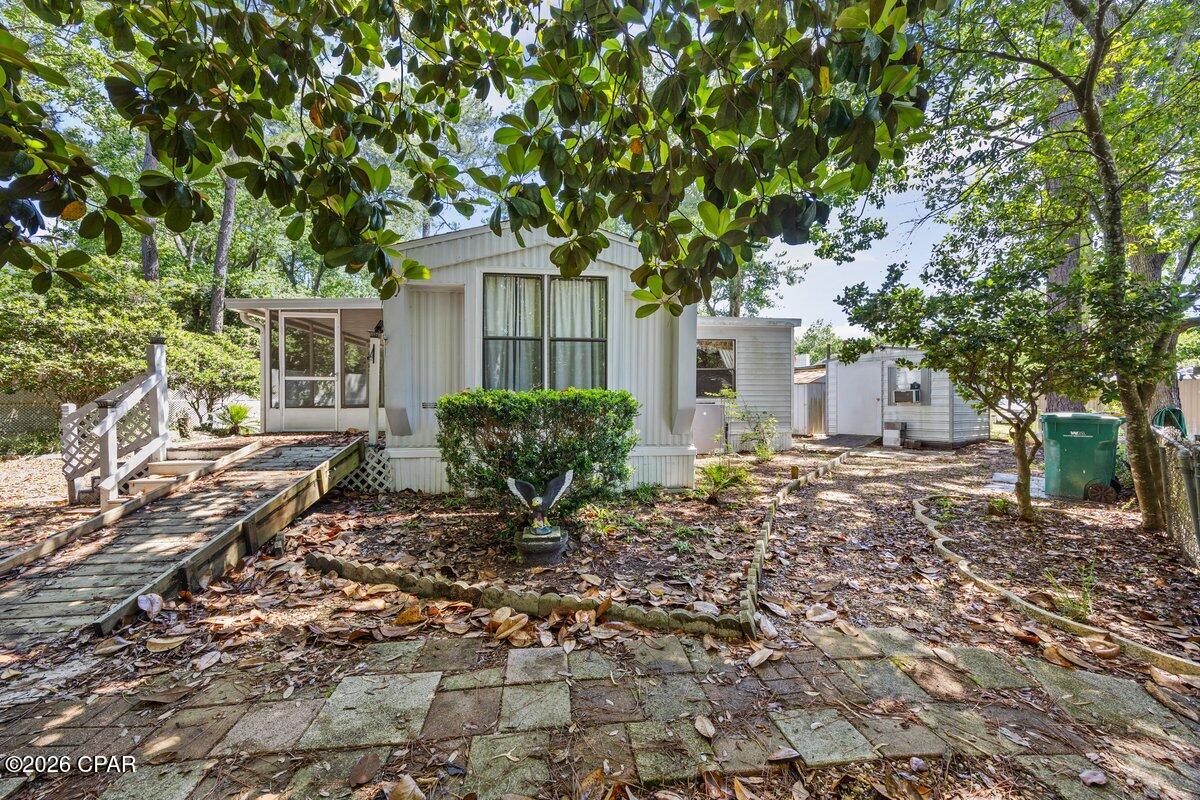 Welcome to 2 Sarah Lane in Fort Walton Beach, a move in ready home that combines comfort, functionality, and major updates that give buyers peace of mind. Recent improvements include a new roof, updated plumbing, and a new HVAC system installed in 2024. Inside, you'll find a bright and inviting layout with an open living area that flows naturally into the updated kitchen featuring stainless steel appliances and plenty of cabinet space. The spacious primary suite offers a private bathroom with a separate soaking tub and shower along with a generously sized closet. Additional rooms provide flexibility for guests, family or a home office setup. Outside, the private backyard creates the perfect space to relax, entertain, or simply enjoy the outdoors. The property also includes a workshop, additional yard storage building, detached carport and a ramp for accessibility. For added confidence, the home has successfully passed VA inspections and includes updated anchor points. Well maintained and thoughtfully updated throughout, this home is ready for its next owner.
