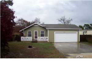 Laguna Beach House!!! Seller updated include a new water heater, recently painted exterior with Hardi board siding on front of home, new porch railings and a new double garage door. Walk to the beach or hop on the trolley, both nearby. Close to Pier Park, restaurants and entertainment, and the Gulf of Mexico. Great starter home or investment home. Come and enjoy the beach life!
