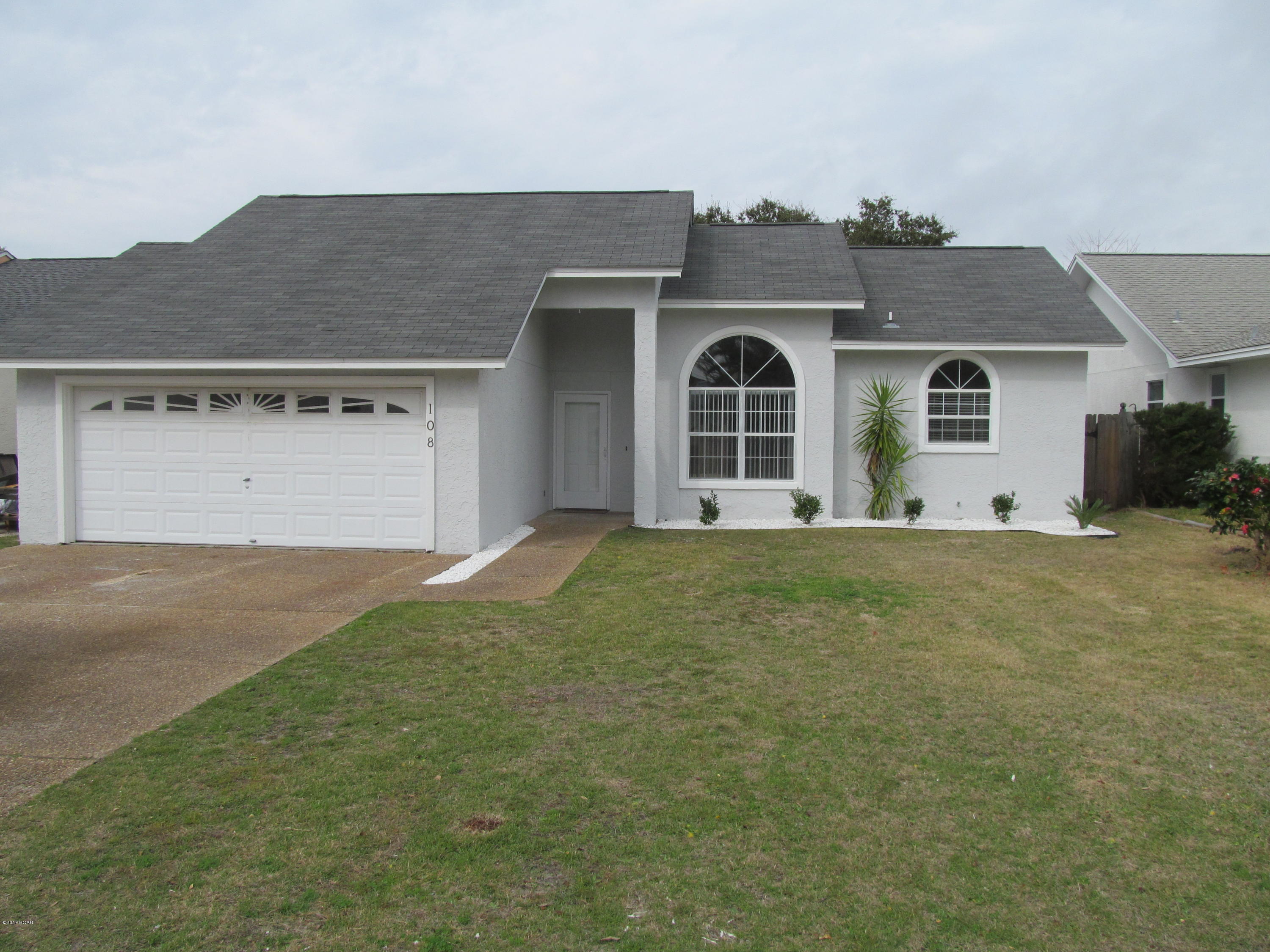 Remodeled 2 bedroom 2 bath home with 2 car garage and fenced back yard and covered patio with storage area. - This beautiful home offers all tile and the inside is completely all new from ceilings to floors.  The master has a nice walk in closet- the kitchen offers plenty of cabinets and pantry. The laundry is in the garage. The heat, water heater and stove are natural gas. Both bath rooms offer heated lights- for the winter or chilly days- There is a sprinkler system for the front lawn only. There is an exterior shower for when you return home from a dedicated beach . The owner will allow a small dog under 15lbs, there will be a pet deposit plus $25 pet rent per month. The tile will have to be professionally cleaned and receipt provided when you move out.  Bid a wee beach access