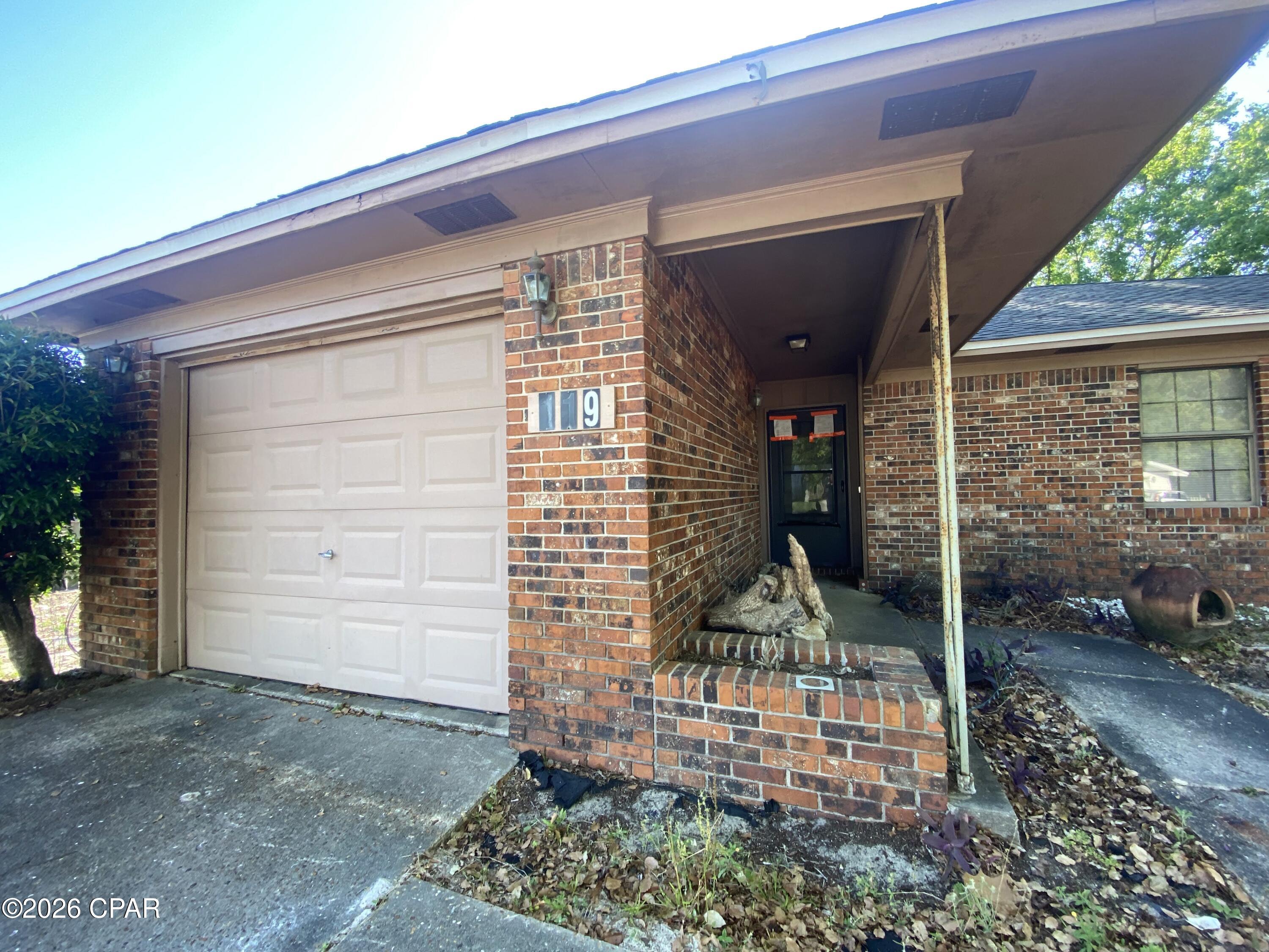 NEEDS A CASH, QUICK CLOSE OFFER ASAP! This three-bedroom, two-bathroom brick home offers a huge investment opportunity on a prime corner lot in the highly sought-after west end of Panama City Beach. It features a large, fenced yard and single-car garage with a newer HVAC. It has been tenant-occupied for years and needs renovations. There was a plumbing overflow on approx May 3 and those areas need immediate water remediation. The power is currently off, making this a project for a buyer looking to capitalize on a property with great potential in a high-demand area. 

The location is exceptional, situated just a third of a mile from local amenities and about a mile from the shopping, dining, and entertainment at Pier Park. Coastal living is convenient with Public Beach Access only a mile away, and the neighborhood is golf-cart friendly - allowing for easy trips to Frank Brown Park or North Pier Park. Strategically positioned, the home is also a short drive from the new hospital and ECP Airport. This community offers the coastal lifestyle without the fees of an HOA. No short-term rentals are allowed. 

Renovated comparable homes in the immediate area have sold for 350k. This property has significant upside for those ready to provide the necessary repairs. This home is being sold as-is and all cash offers are considered. Schedule your showing today.