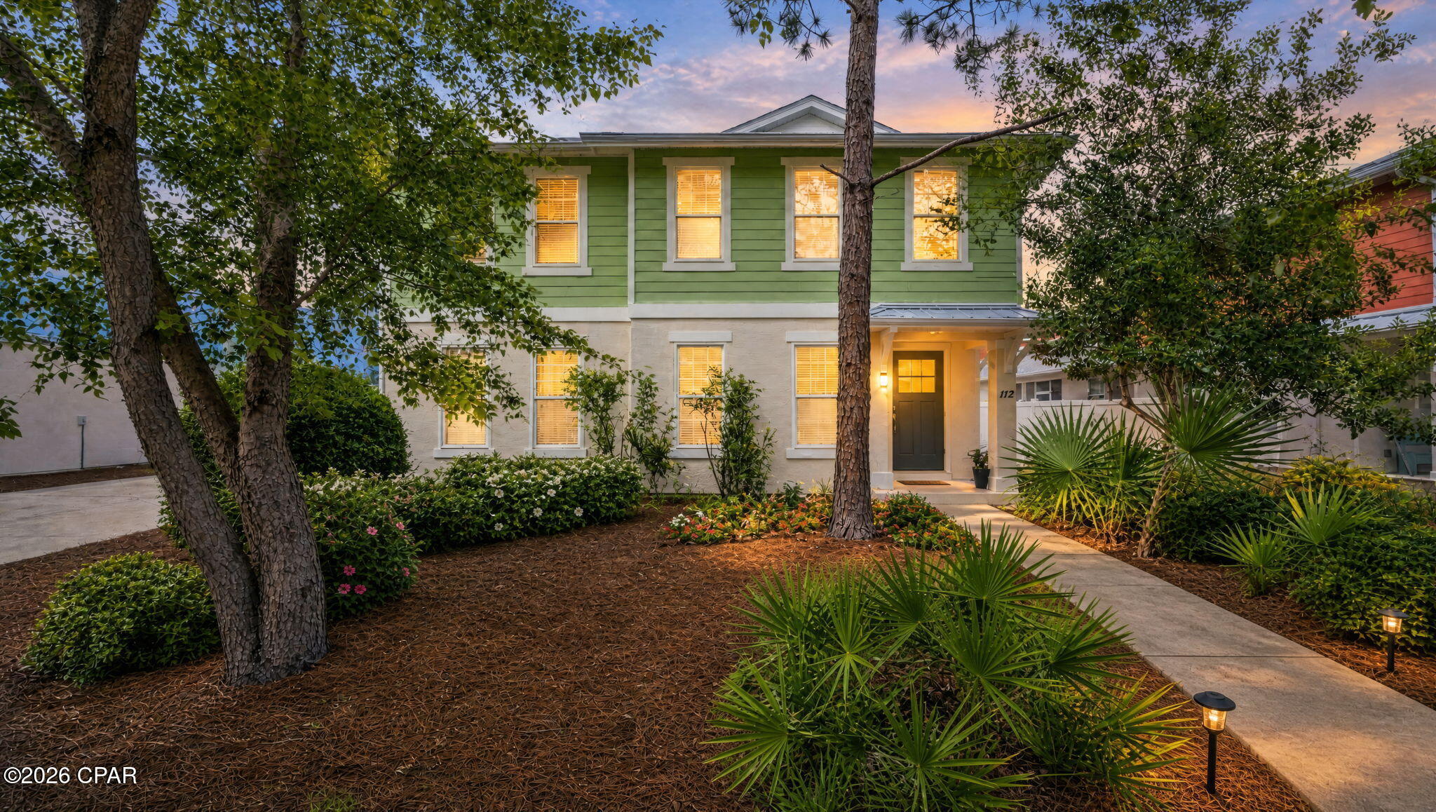 Welcome to 112 Sand Oak Boulevard, a beautifully maintained home in the highly desirable Whisper Dunes community on the west end of Panama City Beach. Offering 1,749 square feet of thoughtfully designed living space, this 3-bedroom, 2.5-bath home features a versatile upstairs loft that can easily serve as a home office, media room, playroom, or additional guest space.

The open-concept floor plan creates an inviting atmosphere for everyday living and entertaining, with abundant natural light flowing throughout the main living areas. The spacious owner's suite provides a private retreat and includes a rare convenience--a stackable washer and dryer located directly within the primary bathroom. An additional full-size laundry area upstairs means you'll never have to carry laundry between floors again.

Upstairs, two guest bedrooms share easy access to the loft and secondary bath, creating a functional layout that offers both privacy and flexibility. Outside, enjoy the low-maintenance lifestyle Whisper Dunes is known for, with beautifully maintained common areas and community amenities.

Ideally located just minutes from the sugar-white beaches of the Gulf, Pier Park, dining, shopping, entertainment, and the scenic communities of 30A, this home combines comfort, convenience, and coastal living in one exceptional package.

Whether you're searching for a primary residence, second home, or investment opportunity, 112 Sand Oak Boulevard offers a unique blend of functionality and location in one of Panama City Beach's most sought-after west-end neighborhoods.