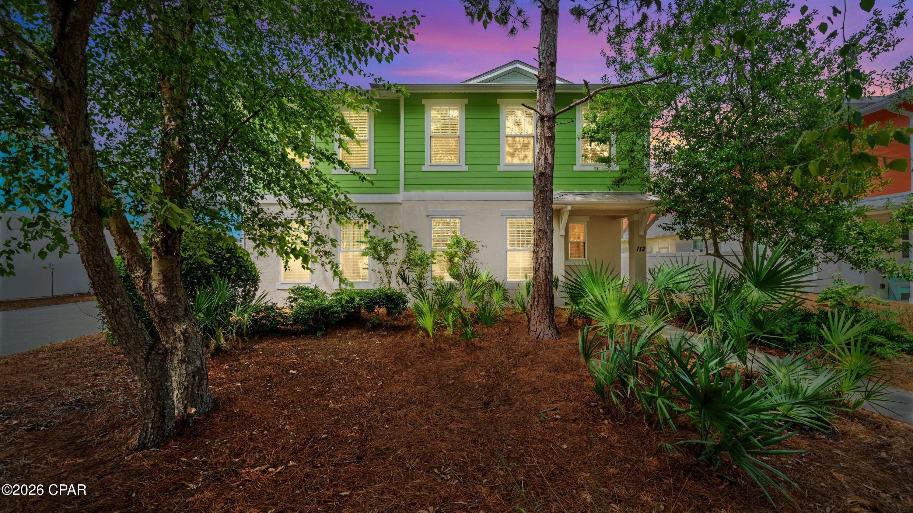 Welcome to 112 Sand Oak Boulevard, a beautifully maintained home in the highly desirable Whisper Dunes community on the west end of Panama City Beach. Offering 1,749 square feet of thoughtfully designed living space, this 3-bedroom, 2.5-bath home features a versatile upstairs loft that can easily serve as a home office, media room, playroom, or additional guest space.

The open-concept floor plan creates an inviting atmosphere for everyday living and entertaining, with abundant natural light flowing throughout the main living areas. The spacious owner's suite provides a private retreat and includes a rare convenience--a stackable washer and dryer located directly within the primary bathroom. An additional full-size laundry area upstairs means you'll never have to carry laundry between floors again.

Upstairs, two guest bedrooms share easy access to the loft and secondary bath, creating a functional layout that offers both privacy and flexibility. Outside, enjoy the low-maintenance lifestyle Whisper Dunes is known for, with beautifully maintained common areas and community amenities.

Ideally located just minutes from the sugar-white beaches of the Gulf, Pier Park, dining, shopping, entertainment, and the scenic communities of 30A, this home combines comfort, convenience, and coastal living in one exceptional package.

Whether you're searching for a primary residence, second home, or investment opportunity, 112 Sand Oak Boulevard offers a unique blend of functionality and location in one of Panama City Beach's most sought-after west-end neighborhoods.