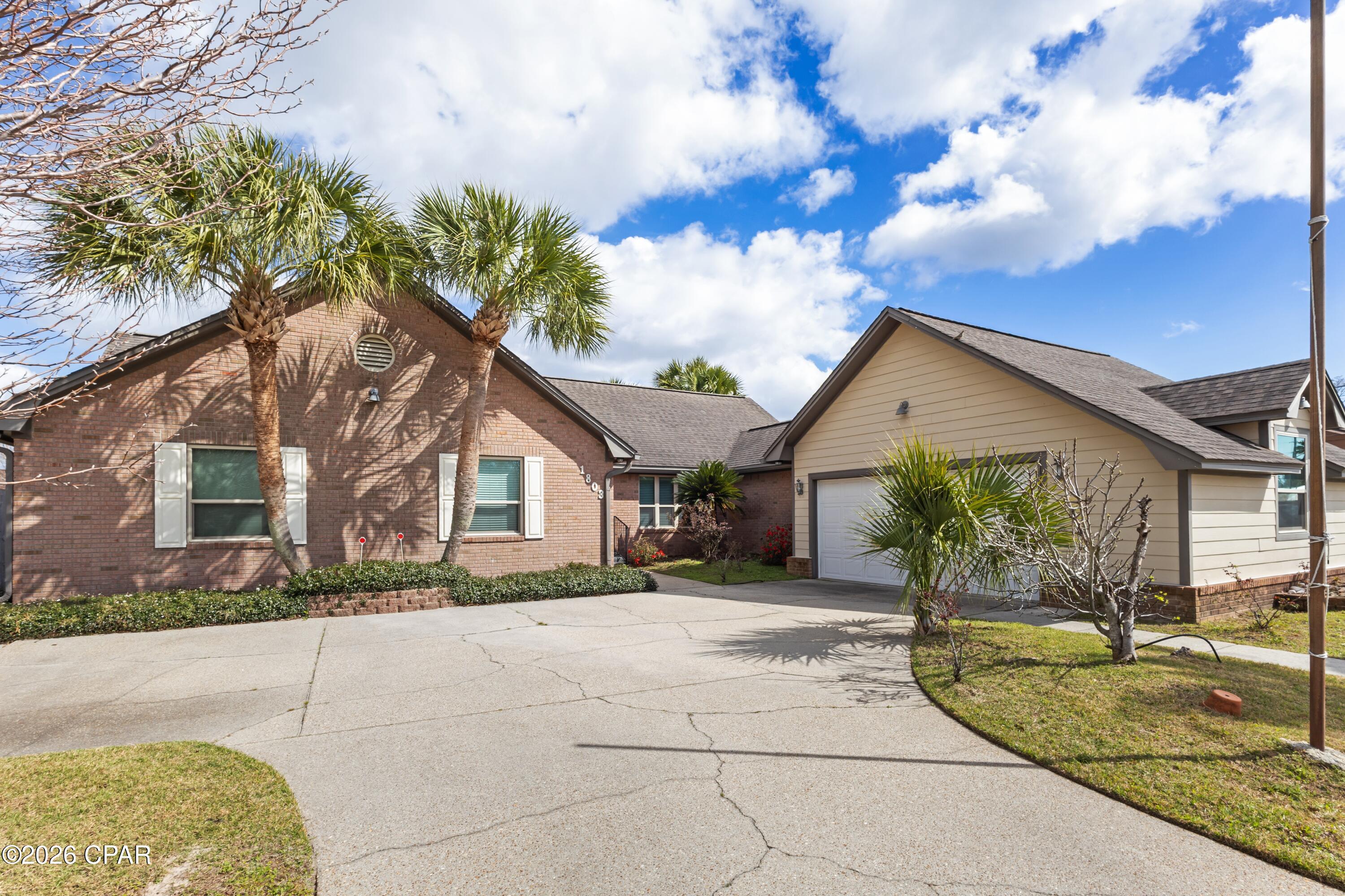 All sizes are apx--taken from tax records--Very nice home and floor plan---4br/2 baths over 2300 sf Heat/cool--Large covered pergola as porch on the back of home---New well/pump/sprinkler system, new hot water heater, stainless steel appliances//New AC/Heat unit//new tile throughout//new tile shower in master bedroom//new garage door/// updates through out home!!Very nice floor plan--privacy fenced- large back yard--New roof --put on April 2026---Best deal in Lynn Haven--Norhtridge area!!!