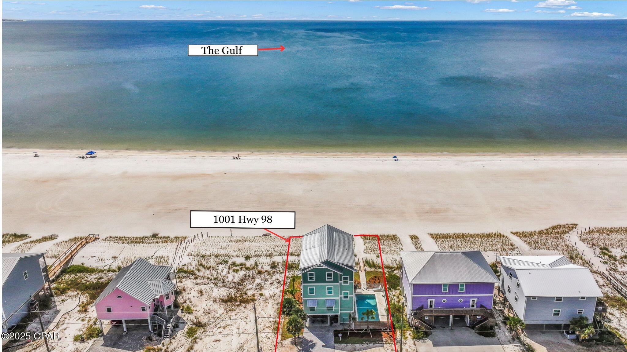 BEACHFRONT SANCTUARY!! This coastal retreat is designed to elevate every moment of Gulf-front living. Nestled directly on the water, this 6-bedroom, 6-bath residence is perfectly suited for multi-family gatherings, vacations with friends, or as a bold investment in luxury real estate. From the moment you arrive, the airy, open layout draws you in with panoramic Gulf views that fill the home with light & inspiration. The chef's kitchen, complete with modern appliances & a generous island, sets the stage for effortless entertaining & memorable meals with family & friends. Each floor is thoughtfully designed for privacy & comfort. The main living level features a seamless flow between the living/dining areas that open to expansive decks—ideal for sipping morning coffee or evening cocktails as the waves roll in. Upstairs, multiple bedrooms offer private baths, direct balcony access & shared outdoor seating perfect for watching breathtaking sunsets.  On the ground level, your private oasis awaits with a heated pool elevated above the dunes that invites you to relax beneath the stars. A private boardwalk leads you directly to the sugar-white sands of Mexico Beach, where adventure & serenity are always just steps away. An elevator services every floor, providing convenience & ease throughout the home. Life in Mexico Beach is refreshingly laid-back, where neighbors become friends & every day feels like summer. Cruise the quiet streets by golf cart, stroll to local shops & eateries or spend evenings on the beach watching dazzling sunsets paint the sky. Here, the pace slows down just enough for you to savor the simple joys of coastal living. Whether it's sunrise over the Gulf, paddleboard trips along the shore, dinner parties on the deck, or late-night swims under the stars, this property is more than a home—it's an invitation to live like every day is a vacation.  Call for your private tour & LIVE THE BEACH LIFE!