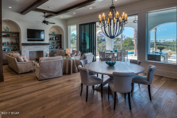 Paradise by the Sea designer home. $224k Rental Projection. Fully Furnished 5BR & 7BA, turn key, and move in ready. 4 large ensuite bedrooms + bunk room with private bath. Oversized 3-car attached garage with ample storage. Deeded beach access. 1/4 acre lot with new privacy wall surrounding the heated pool, spa, and courtyard. Over 7,000 square feet under roof with amazing gulf views from the 2nd and 3rd floor enormous balconies. Slider door opens living area to the poolside oasis & summer kitchen. Smart technology through out. Every bedroom and bunk room has a private bath room. Ample storage space in attic and 3-car garage. Every aspect of this home is custom designed to be a One of Kind. 6 passenger golf cart and Young Chang baby grand piano included.