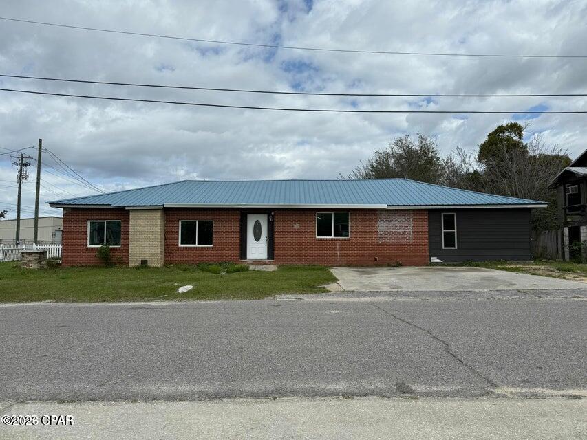 Priced to sell and within your Budget.  This home is a 4 bedroom and 2 bath located in the center of Panama City.  Home has been remodeled to include a large kitchen with ample breakfast bar island.  New plank wood flooring throughout the home.  Al bathrooms have been fully remodeled.    You have 4 bedrooms where one room can be an office or bonus room. The garage was fully enclosed as an additional Bonus Room or Bedroom, thus increasing the square footage.  Home is currently rented month to month at $2000 per month.  We have two more homes for sale being rented at $2000 per month each for those investors wanting to purchase and put their money into a solid 3 home rental investment.   All measurements and information are estimates and must be verified.