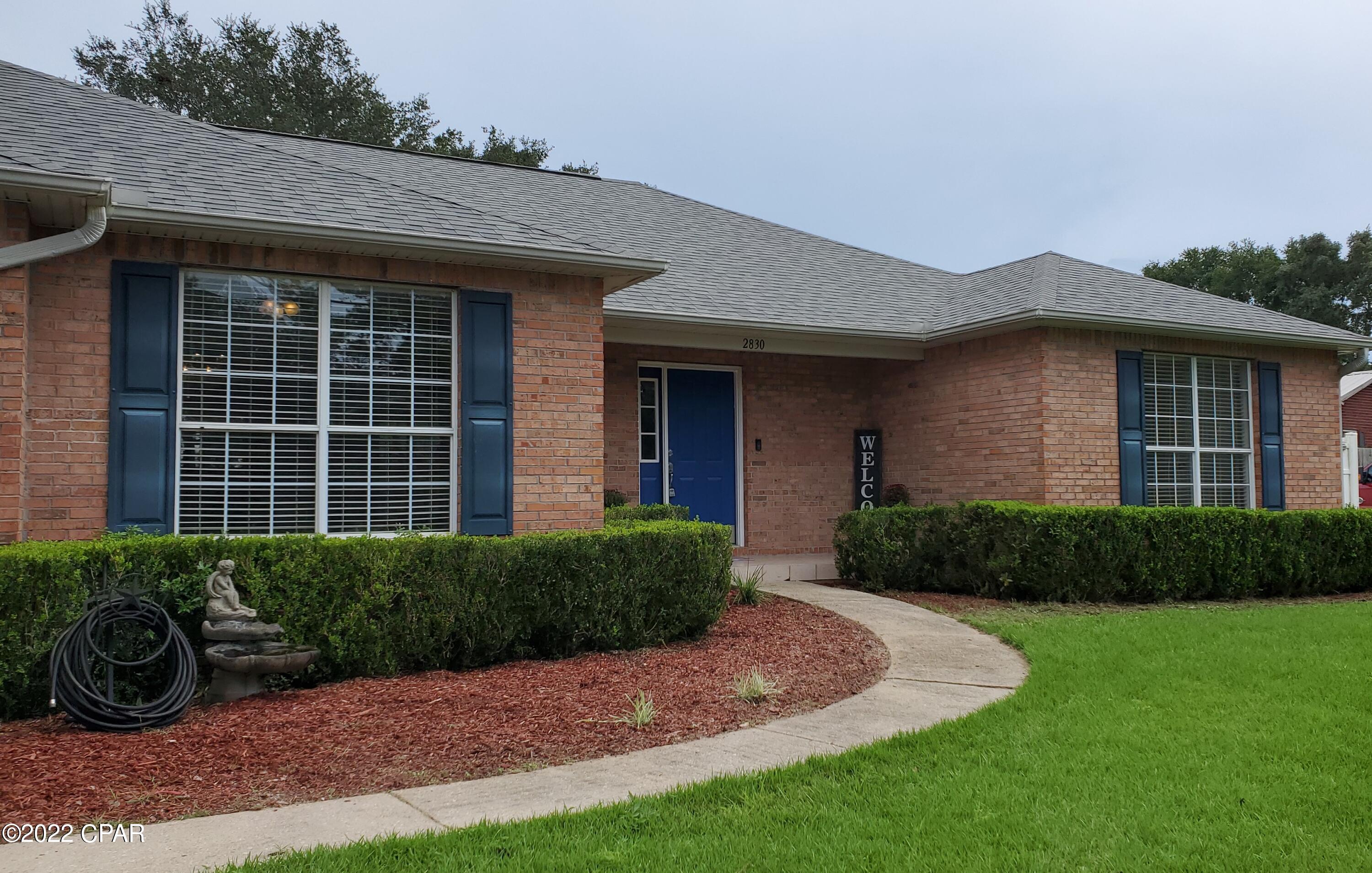 Beautiful 4/2 HOME! This home features a split floor plan. The large Master Bedroom has an extra seating area and a large newly remodeled beautiful Master Bath. The new tiled shower is 8 ft long and 4 ft wide! New double vanity and garden tub make this the perfect space for relaxing.  Large walk in closet. Three additional Bedrooms and Bathroom are along the opposite side of the house. The spacious screened in patio opens up to a very private backyard. Great room has a wood burning fireplace, 7.1 Dolby Surround, vaulted ceilings, new luxury vinyl plank flooring. Large Kitchen is perfectly located between a Breakfast Area and the Formal Dining. Large Garage with extra storage, Laundry Room. Beautifully landscaped, extra parking for your boat