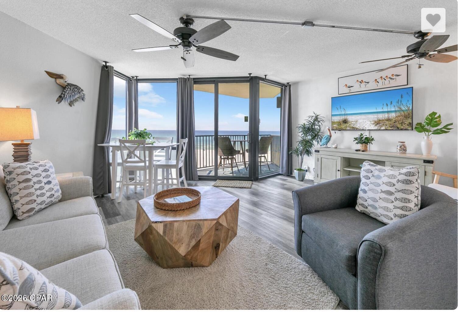Discover the ultimate coastal escape in this stunning Gulf front condo, where the rhythm of the waves and the warmth of white sandy beaches become your everyday reality. From the moment you step inside you are greeted by the kind of luxury that turns a vacation into a lifestyle and a lifestyle into a smart investment.

The completely remodeled kitchen sets the tone with sleek quartz countertops, beautiful white cabinetry with updated handles and matching white appliances that bring a clean crisp coastal aesthetic to the heart of the home. 

The shiplap detailing adds that signature beach home character while luxury vinyl plank flooring runs throughout combining beauty with the durability that a Gulf front property demands. The standout spa-inspired shower fully tiled with a glass door enclosure elevates the bath experience well beyond your ordinary condo. And the furniture? This one comes curated with higher end pieces that photograph beautifully and keep guests coming back.

Positioned in the best C location in the building your direct Gulf front views stretch across the shimmering emerald waters and the pristine white sandy beaches that make Panama City Beach one of the most sought-after destinations on the Gulf Coast.

Sunbird delivers on every level with a fitness center, attentive security, tennis/pickleball courts, fountains, Washer/dryer facilities, grills, three pools including one heated pool and a recently redone center pool along with a building that passes all inspections and an exceptional HOA team keeping everything in top condition. Walk to Pineapple Willies, Walmart, Waffle House and a number of dining options and soon Tootsies rising where the iconic Spinnakers once stood.

This is not just a place to escape. It is a proven income-producing asset in one of Florida's most popular beach markets. Whether you are searching for your personal coastal retreat or a high-performing short-term rental investment this condo checks every box.