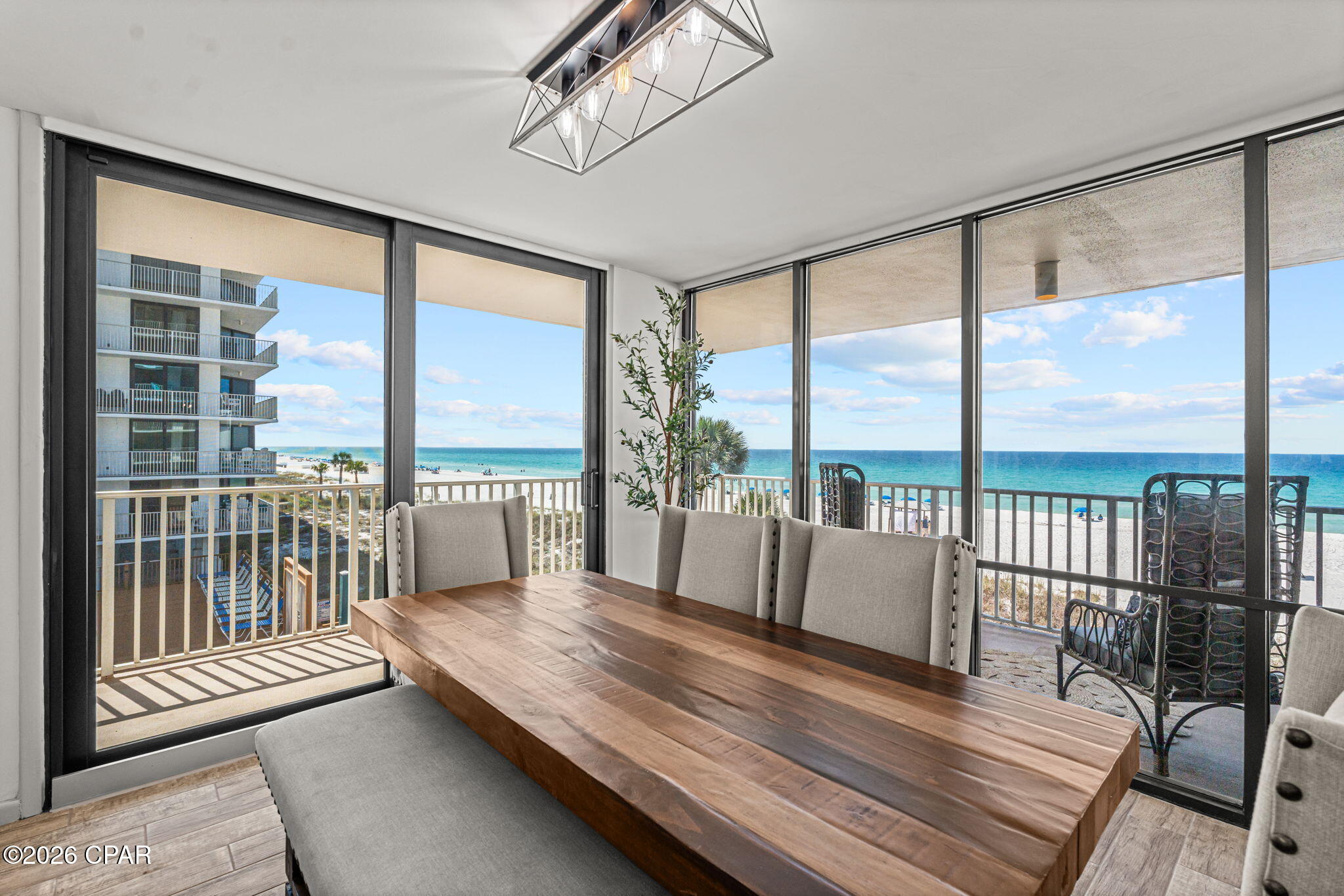 Welcome to 11757 Front Beach Road W200, a spacious and thoughtfully updated 3-bed condo in Panama City Beach designed for both everyday comfort and coastal living with panoramic views, and a fully updated interior within Edgewater Beach and Golf Resort. Positioned in the quieter Windward building, this corner unit combines privacy, natural light, and access to a full suite of resort-style amenities along Front Beach Road. Located in the exclusive Windward building, owners benefit from a more private, low-density environment while still enjoying full access to Edgewater Beach and Golf Resort. The interior reflects a comprehensive upgrade timeline, beginning with major system improvements including a new 4.5 ton AC unit, blower, water heater, appliances, and flooring updates in 2020. Continued enhancements include a WiFi thermostat in 2022 and a full suite of 2025 updates such as a new stove, kitchen sink, counters, backsplash, updated lighting, faucets, hardware, LVP flooring in storage areas, custom mirror framing, and fresh interior paint throughout. The home is further elevated by all new windows and four sliding glass doors installed in 2025, along with refreshed exterior balcony trim. Edgewater Beach and Golf Resort is a full-service community offering eleven pools, six hot tubs, an executive par 3 nine-hole golf course, fitness center, tennis courts, pickleball courts, a kids splash pad, and direct beach access with dining and recreation options. Offered furnished this condo is move-in ready and well suited as a primary residence, second home, or investment property. Ideally located on Front Beach Road, you are minutes from local restaurants, shopping, and entertainment!