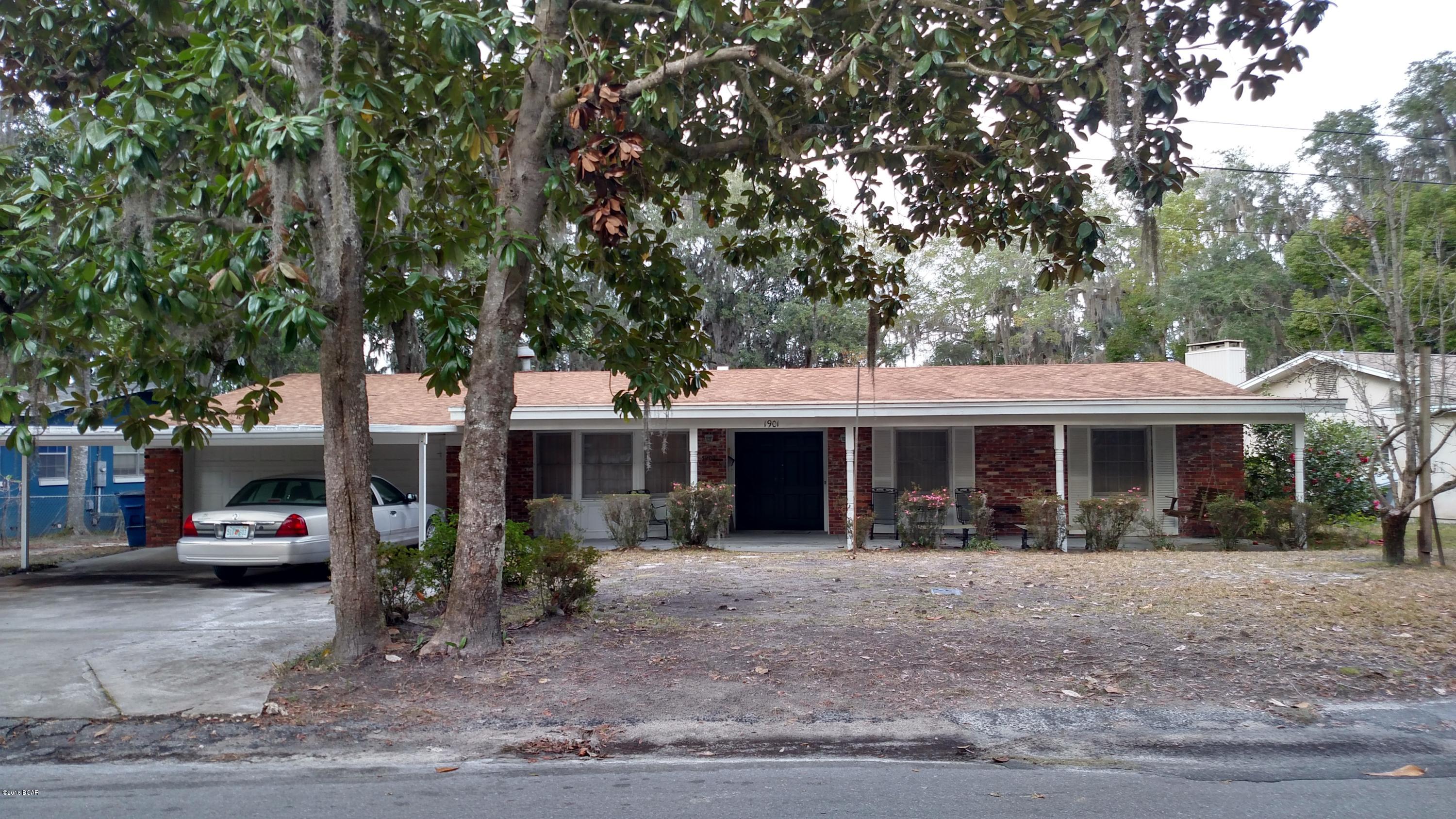Rare find - reasonably priced waterfront home on Watson Bayou. Built in 1965, in good condition but ready for updating. Includes a boat dock, boat house, storage/workshop building, beautiful oak trees and very high elevation overlooking the Bayou. Rear and side windows have built in rouladen shades for excellent storm protection. Spacious two-car garage & carport. A waterfront home in the Bunkers Cove area with deep water access on Watson Bayou with access to St. Andrews Bay, the intercoastal waterway and Gulf of Mexico...and just 6.6 miles by boat to Shell Island. The solid brick home has three bedrooms, two full baths, & terrazzo floors. One year AHS Home Warranty included! Rare find, a waterfront home in the Bunkers Cove area of Panama City with deep water access on Watson Bayou with access to St. Andrews Bay the intercoastal waterway and Gulf of Mexico.... and just 6.6 miles by boat to Shell Island.  The solid brick home was built in 1965 and has three bedrooms, two full baths, 2-car garage, terrazzo floors, and an attractive lot with high elevation and beautiful trees.  The home also has rolladen shutters and a workshop. ERA One year home warranty included!
