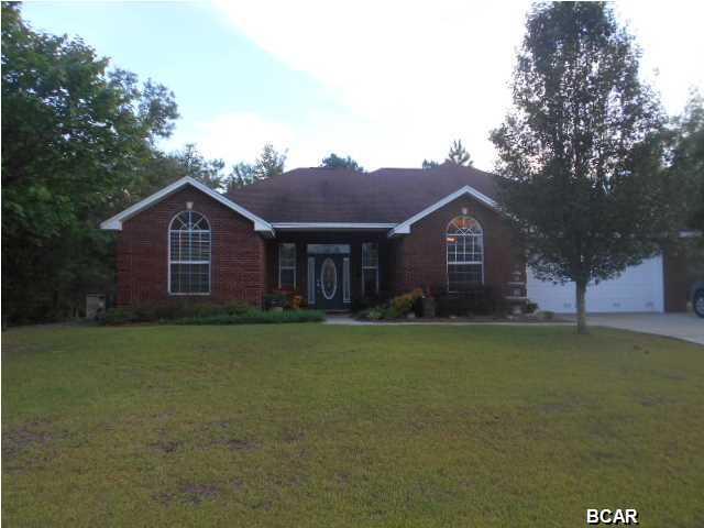 Below appraised value!! Cedar Creek Subdivision is known for it's beautiful brick maintenance free homes with large landscaped lots. Driving through the curvy paved roads; enjoy the green maintained grounds with nice shade trees and peaceful quiet countryside. All brick home has custom features like coined corners and arched windows. The large lot is wide and deep with lots of room in the back yard. As you walk up to the covered porch and enter the home, you notice the quality workmanship of the home. The raised trey ceilings with really wide crown moldings give an elegant feel as you enter the tiled foyer, and they are not just in the living area. Only the best in this house! The large living area features a cozy gas fireplace with tall windows on each side for extra light. To the right i kitchen with breakfast room area featuring designer cabinets, corian counters, and an island overlooking the open living area. The extra windows and french door creates a light and airy feel to the kitchen. To the front of the kitchen is the formal dining room. The master suite is on the back right side of the home; hallway has a pantry and laundryroom which leads to the oversized garage on the front that has a separate storage area for tools. The master has enough room for sitting area and huge walk in closet. The master bath has a jacuzzi tub and separate shower with double sink vanity. Split bedroom plan allows privacy as the other two bedrooms and full bath are on the left side of the home. As you exit the living area, there is a large screen porch with plenty of room to enjoy outdoor grilling and cable TV out there. There is propane access for the grill. The best part, no worries for power outages, there is a whole house generator on the right side of the home beside the large ac/heat unit. Room sizes estimated, please verify all information.