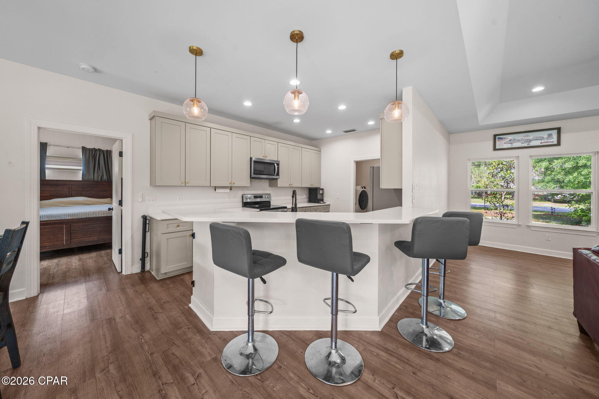 Located on a dead end road in Lynn Haven, this 4 bedroom, 2 bathroom home sits on just over half an acre and offers a great combination of space and convenience. Built in 2021, the home features an open layout with a split floor plan and modern finishes throughout.

Inside, you'll find LVP flooring throughout the home, quartz countertops, soft-close cabinets, and a functional layout designed for everyday living. The spacious lot provides plenty of room for a boat, RV, workshop, pool, or additional outdoor space to enjoy.

Located in an X flood zone and convenient to shopping, dining, parks, and everyday amenities, this newer construction home offers both space and practicality in a desirable Lynn Haven location.
